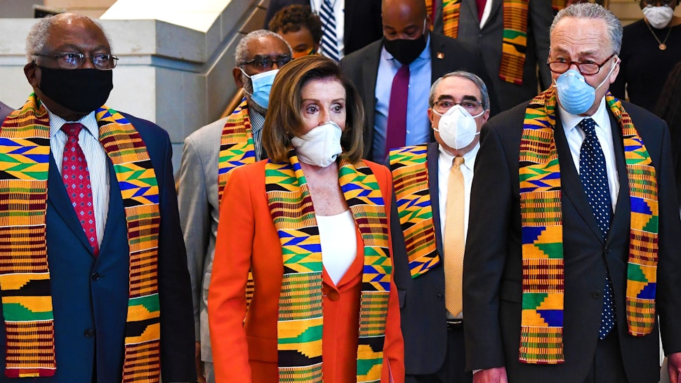UNITED STATES - JUNE 8: Speaker of the House Nancy Pelosi, D-Calif., and other members of Congress gather at the Emancipation Hall, to observe a moment of silence to honor George Floyd, and victims of racial injustice on Monday, June 8, 2020.