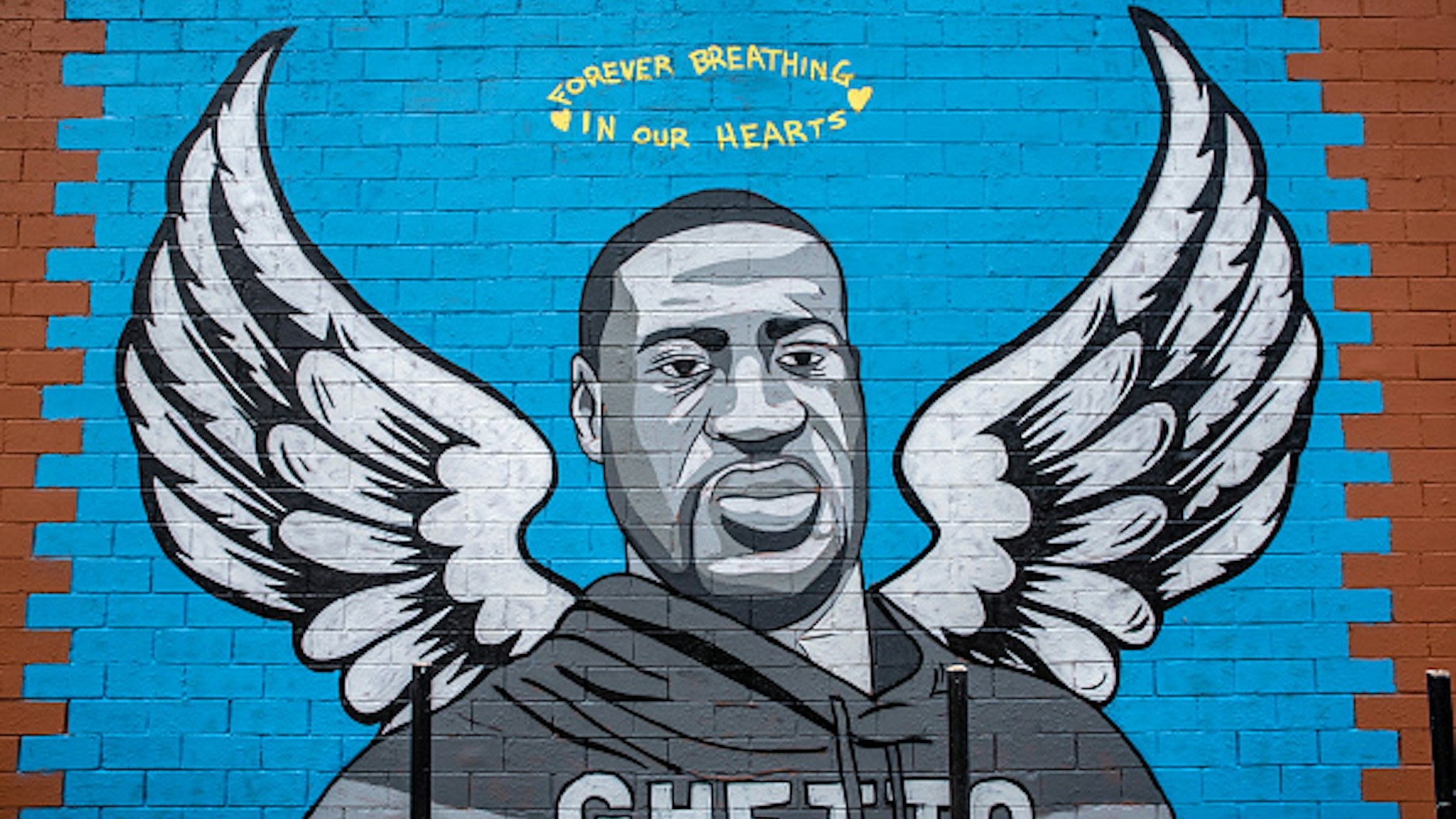 HOUSTON, TX - JUNE 02: A mural of George Floyd is shown painted on the side of Scott Food Mart in the Third Ward before a march in his honor on June 2, 2020 in Houston, Texas. Family members of Floyd were scheduled to participate in a march from Discovery Green to City Hall with support from the local chapter of Black Lives Matter. Floyd, a former resident of the Third Ward, died May 25 while in police custody in Minneapolis, Minnesota.