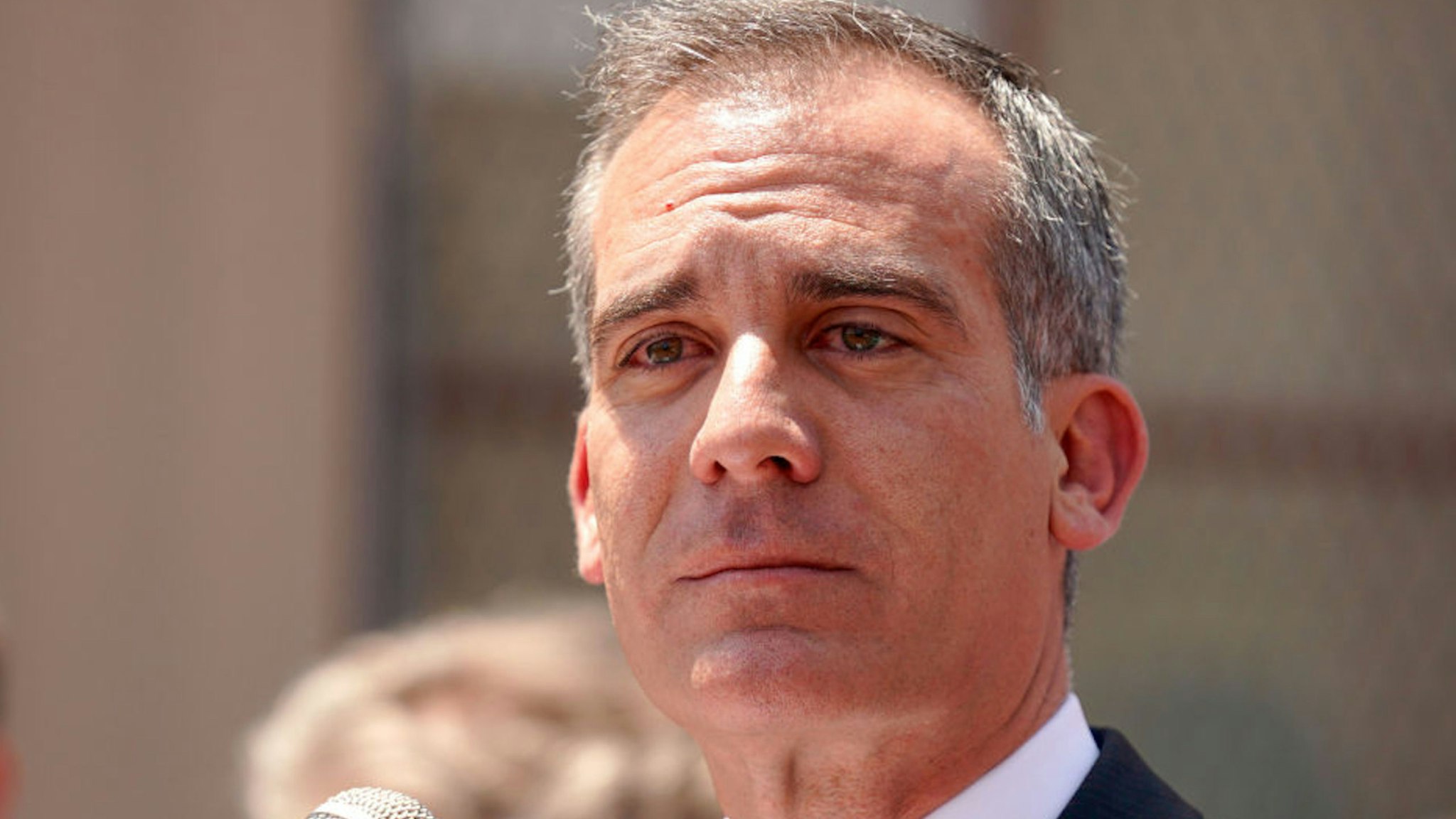 LOS ANGELES, CA - JUNE 05: Los Angeles Mayor Eric Garcetti eyes water as he gets emotional while speaking during a press conference at Western Avenue Elementary School in Los Angeles on Wednesday, June 5, 2019. Garcetti, school board members and labor leaders gathered to discuss the loss of Measure EE in the polls and how they will fight to find money for the school district.