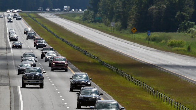 Motorists stream down I-40 westbound as the eastbound road is empty as the evacuation of the North Carolina coast continues in advance of Hurricane Florence near Suttontown, N.C. Wednesday, Sept. 12, 2018.