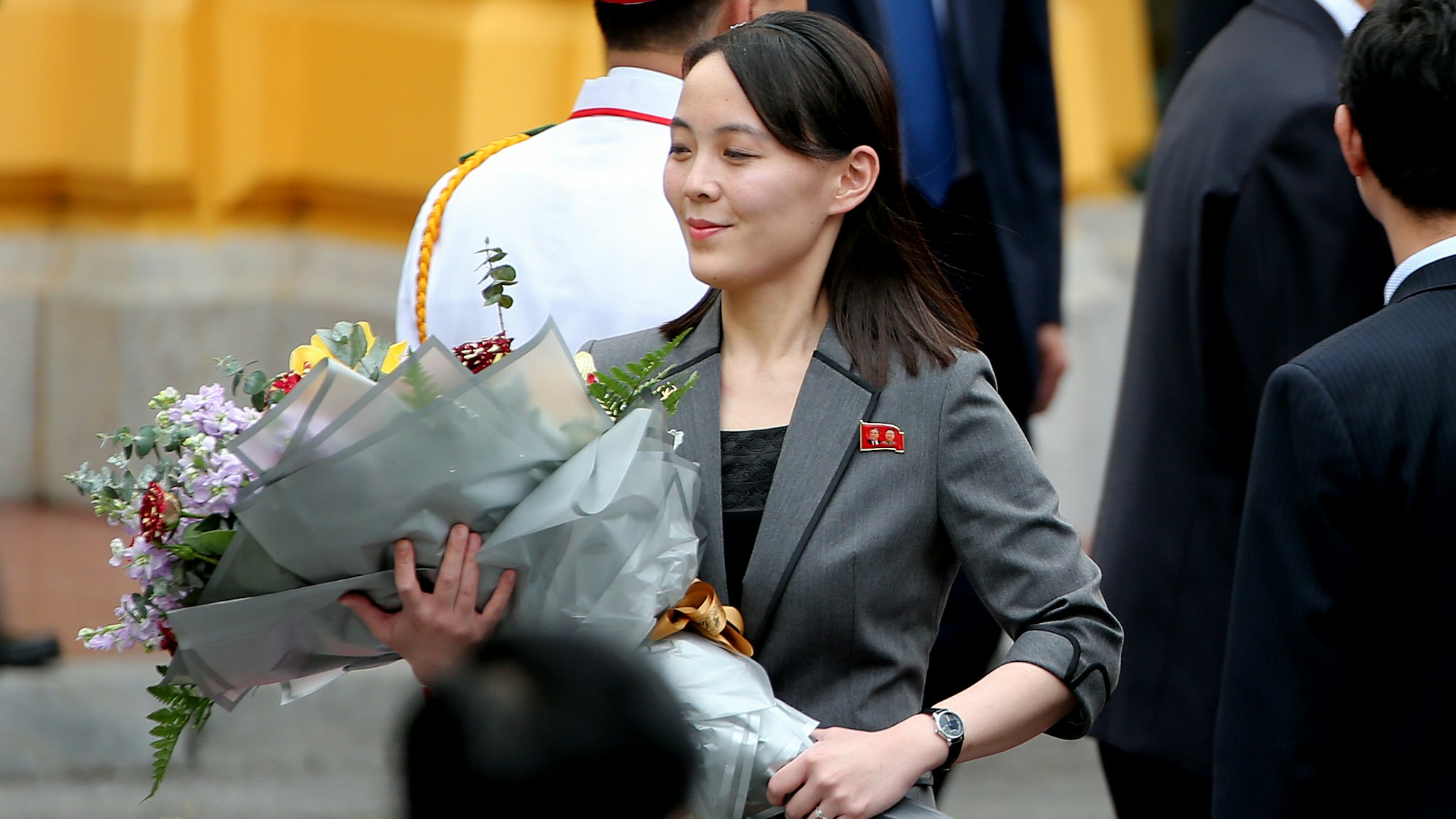Kim Yo Jong, sister of North Korean leader Kim Jong Un, holds a flower bouquet during a welcoming ceremony at the Presidential Palace in Hanoi, Vietnam, on Friday, March 1, 2019. Kim will have a long train ride home through China to think about what went wrong in his second summit with Donald Trump and how to keep it from reversing his gains of the past year. Photographer: Luong Thai Linh/Pool via Bloomberg