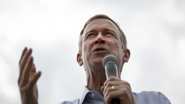 John Hickenlooper, former governor of Colorado and 2020 presidential candidate, speaks at the Des Moines Register Soapbox during the Iowa State Fair in Des Moines, Iowa, U.S., on Saturday, Aug. 10, 2019.