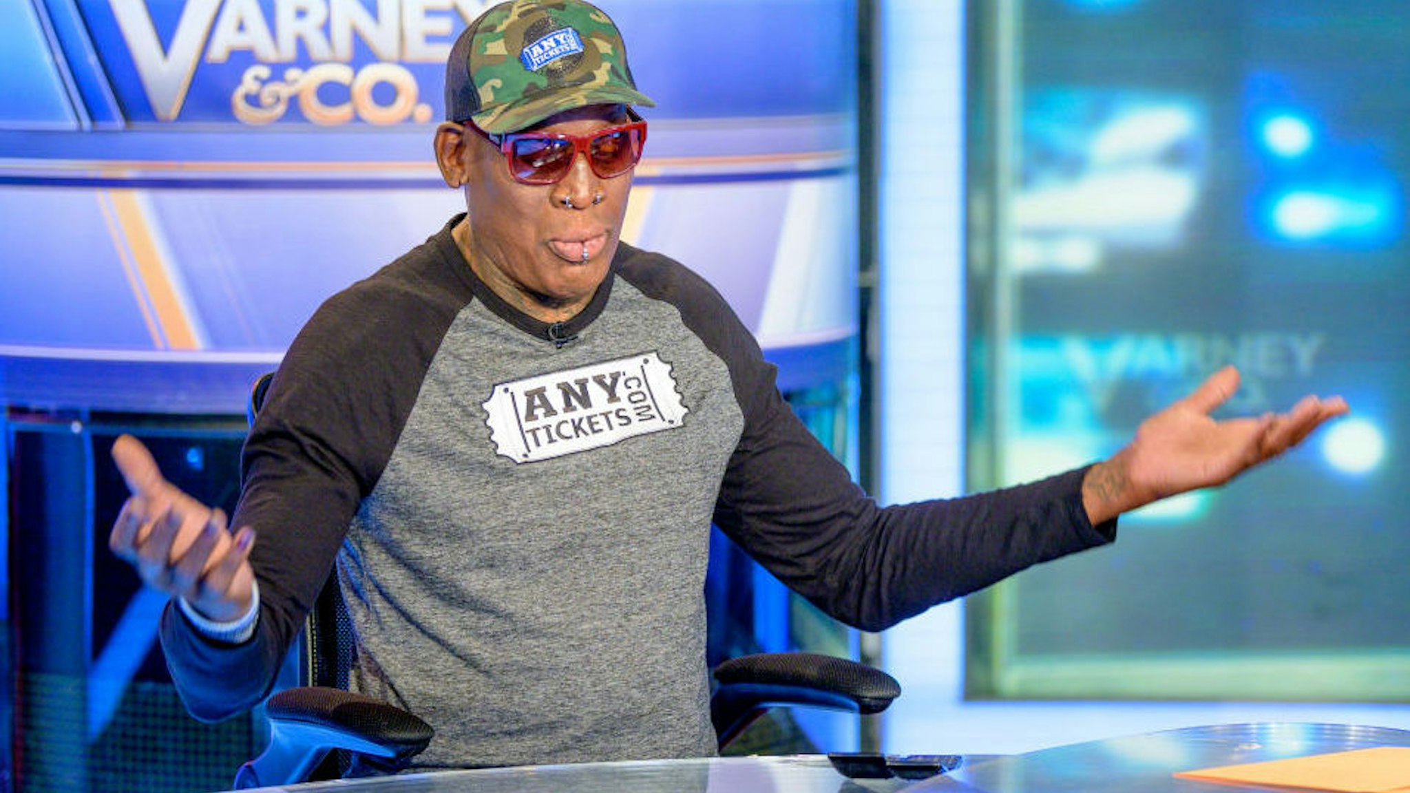 Former NBA Basketball player Dennis Rodman visits "Varney & Co." with guest-host David Asman at Fox Business Network Studios on September 18, 2019 in New York City.