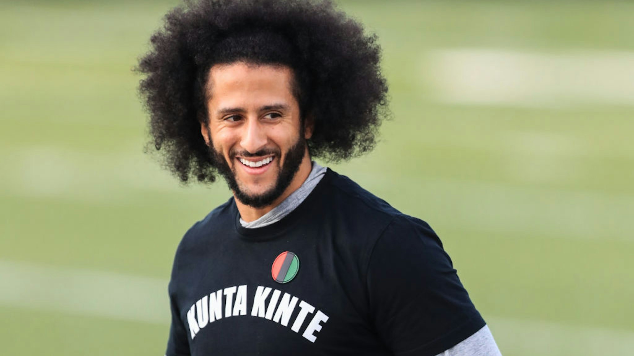 Colin Kaepernick looks on during a private NFL workout held at Charles R Drew high school on November 16, 2019 in Riverdale, Georgia.