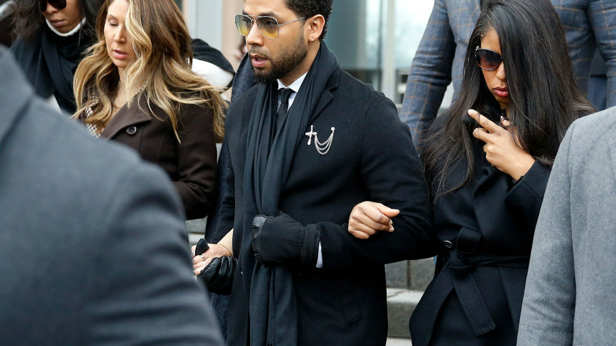 Flanked by attorneys and supporters, actor Jussie Smollett walks out of the Leighton Criminal Courthouse today after pleading not guilty to a new indictment on February 24, 2020 in Chicago, Illinois.