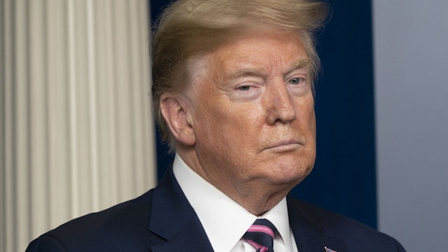 U.S. President Donald Trump listens during a news conference in the White House in Washington, D.C., U.S., on Friday, April 24, 2020.
