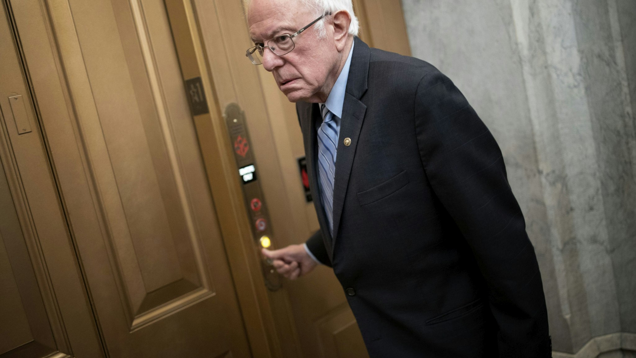 WASHINGTON, DC - MARCH 18: U.S. Sen. Bernie Sanders (I-VT) arrives at the U.S. Capitol for a vote on March 18, 2020 in Washington, DC. Senate Majority Leader Mitch McConnell is urging members of the Senate to pass as soon as possible a second COVID-19 funding bill already passed by the House. (Photo by Win McNamee/Getty Images)