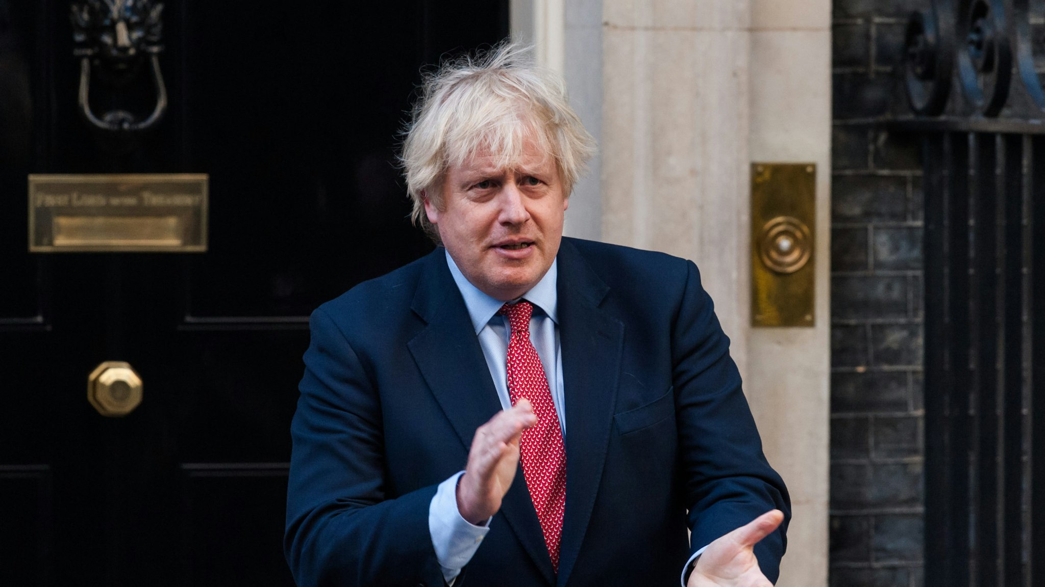 British Prime Minister Boris Johnson claps his hands outside 10 Downing Street during the weekly 'Clap for our Carers' applause for the NHS and key workers on the front line of the coronavirus (Covid-19) pandemic on 28 May, 2020 in London, England. The founder of the event, Ms Annemarie Plas, suggested that after the 10th applause this week, the show of appreciacion should be made an annual event to avoid it being politicised. (Photo by WIktor Szymanowicz/NurPhoto via Getty Images)