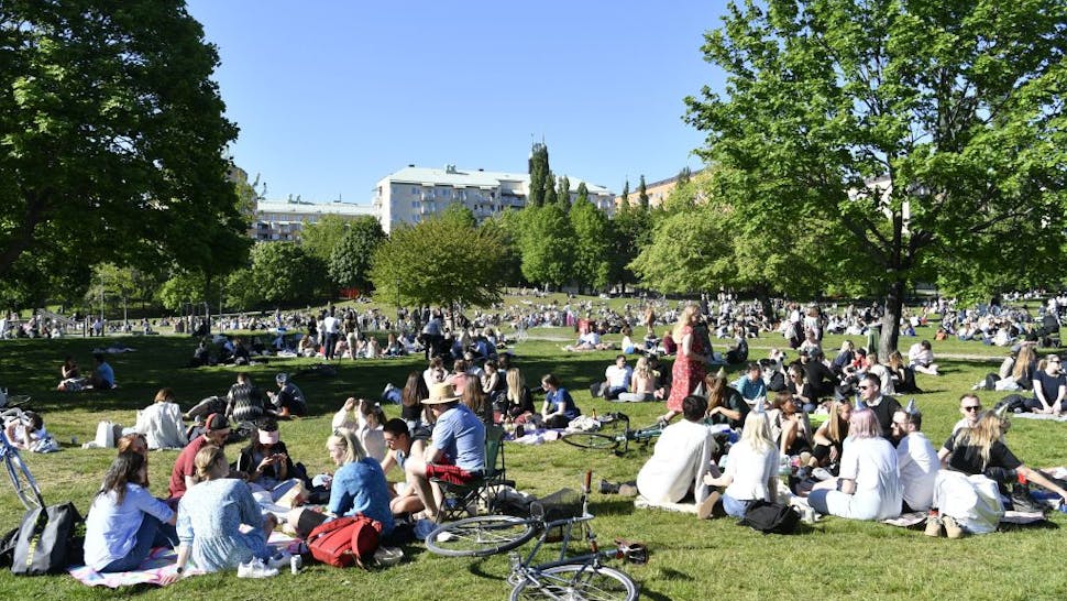 SWEDEN-HEALTH-VIRUS-WEATHER-FEATURE People enjoy the sunny weather in Tantolunden park in Stockholm on May 30, 2020, amid the novel coronavirus pandemic.