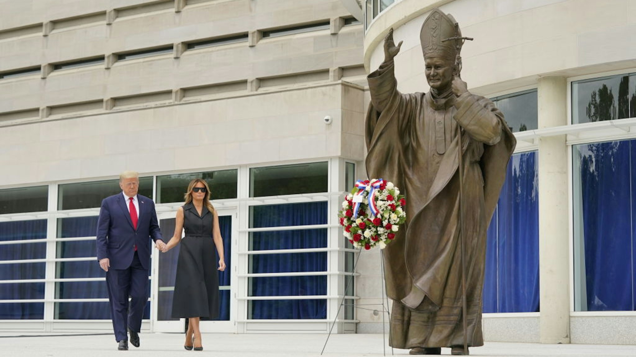 U.S. President Donald Trump and First Lady Melania Trump visit the Saint John Paul II National Shrine in Washington, D.C., U.S., on Tuesday, June 2, 2020.