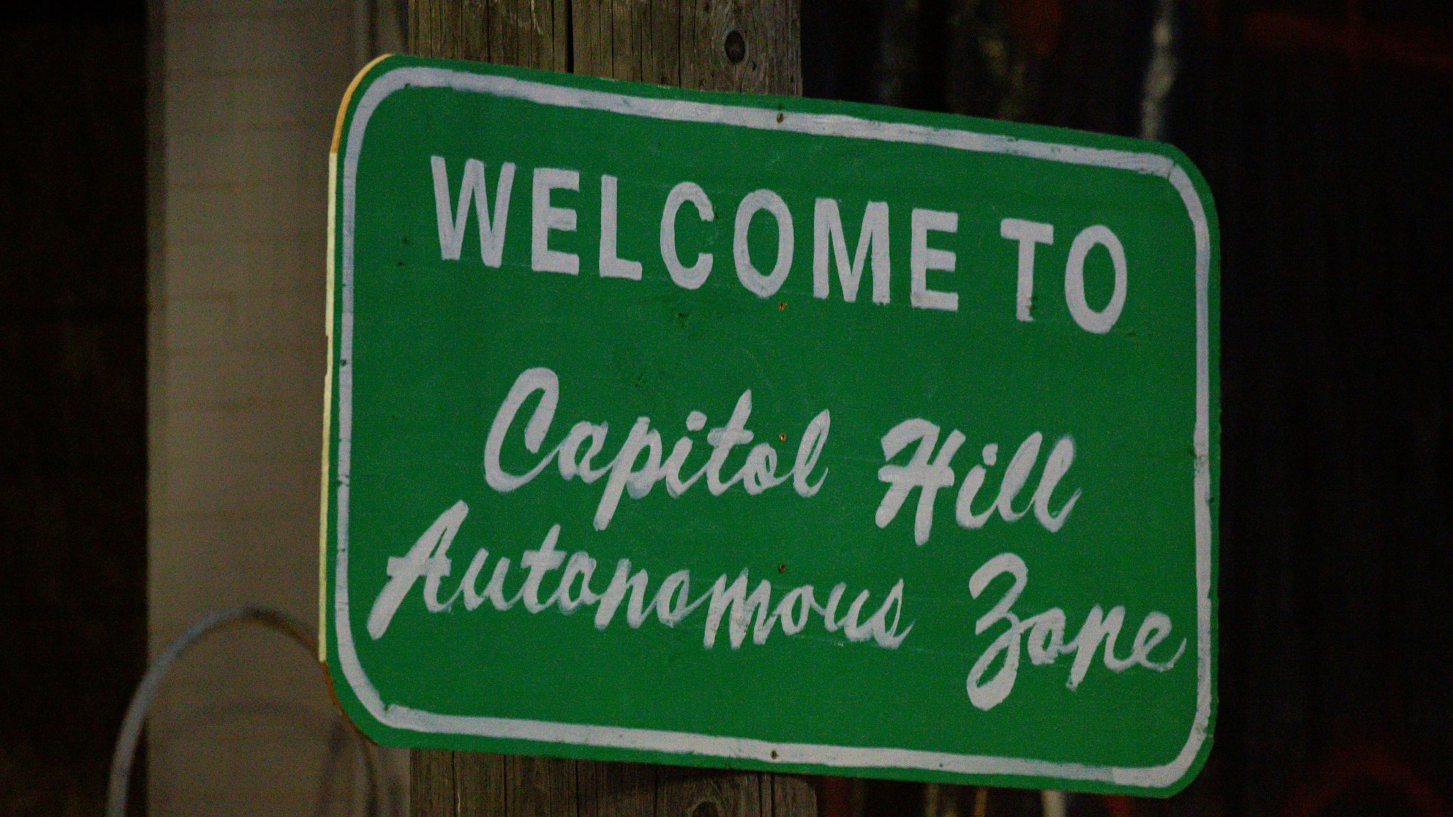 SEATTLE, WA - JUNE 10: A sign welcomes visitors to the so-called "Capitol Hill Autonomous Zone" on June 10, 2020 in Seattle, Washington. The zone includes the blocks surrounding the Seattle Police Departments East Precinct, which was the site of violent clashes with Black Lives Matter protesters, who have continued to demonstrate in the wake of George Floyds death. (Photo by David Ryder/Getty Images)