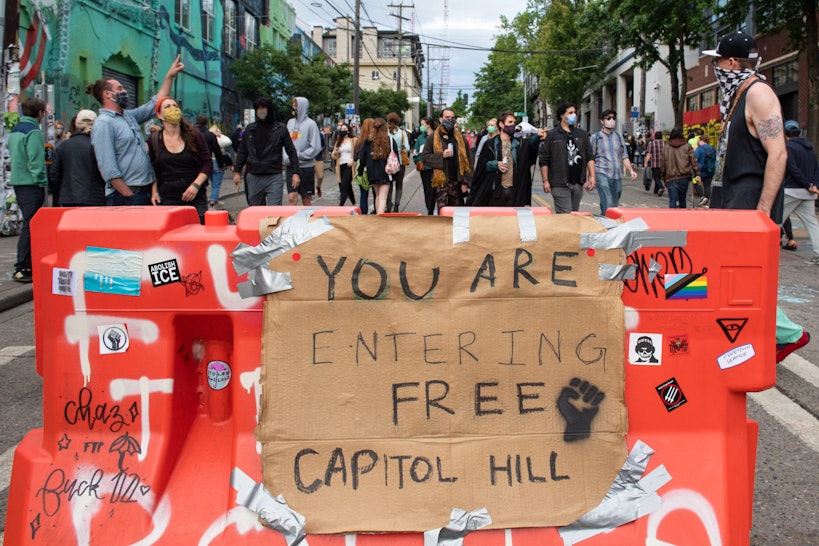 SEATTLE, WASHINGTON - JUNE 12: A sign inside the âCapitol Hill Autonomous Zoneâ in Seattle, Washington on June 12, 2020. The area named âAutonomous Zoneâ was formed after Seattle Police abandoned its East Precinct during protests against police brutality and the death of George Floyd, an unarmed black man who died after being pinned down by a white police officer in Minneapolis, Minnesota, United States on May 25, 2020. (Photo by Noah Riffe/Anadolu Agency via Getty Images)