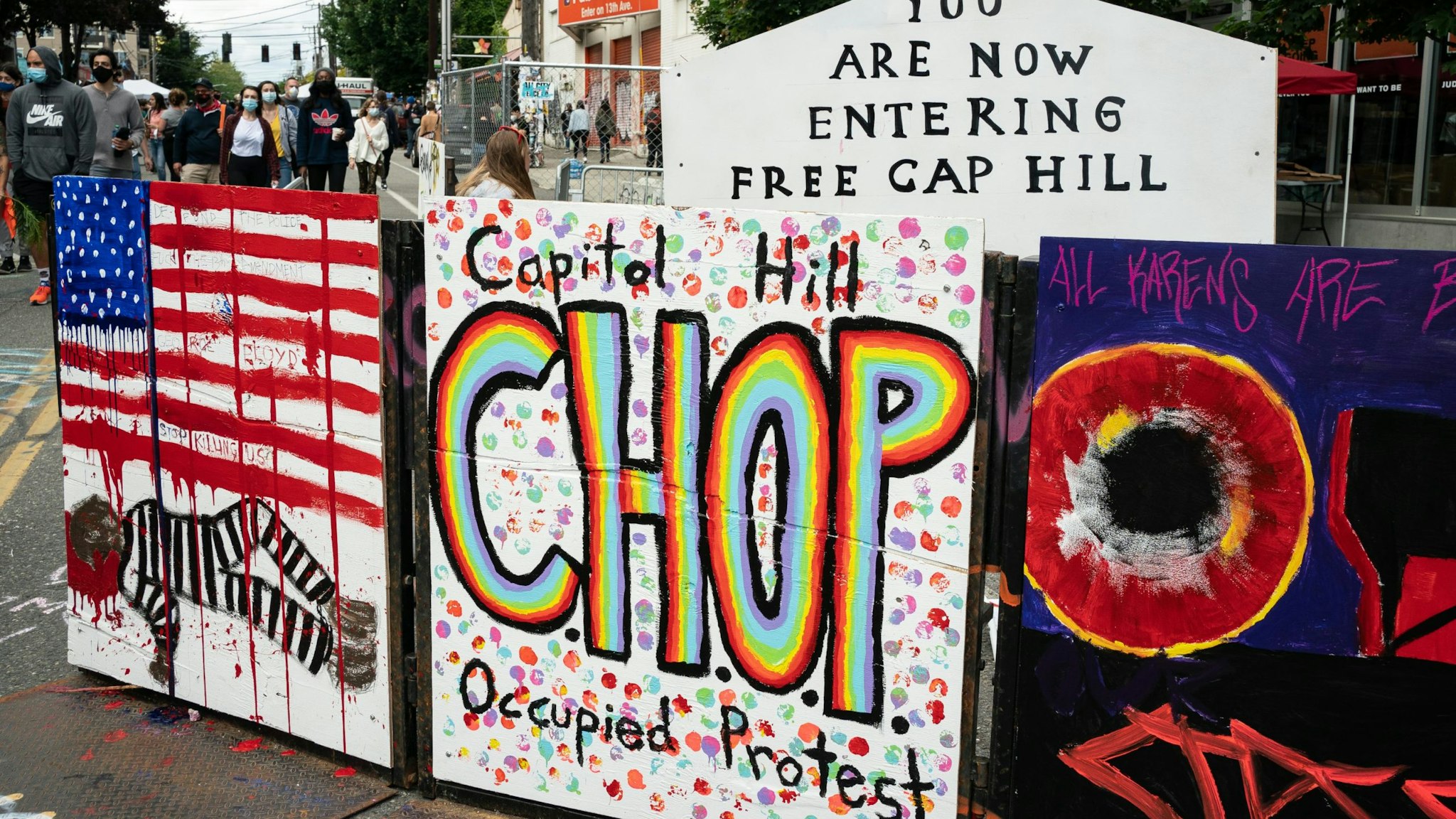 SEATTLE, WA - JUNE 14: A signs reads "Capitol Hill Occupied Protest" in area that has been referred to by protesters by that name as well as "Capitol Hill Organized Protest, or CHOP, on June 14, 2020 in Seattle, Washington. Black Lives Matter protesters have continued demonstrating in what was first referred to as the Capitol Hill Autonomous Zone, which encompasses several blocks around the Seattle Police Departments vacated East Precinct, but what protesters are now calling the "Capitol Hill Organized Protest." (Photo by David Ryder/Getty Images)