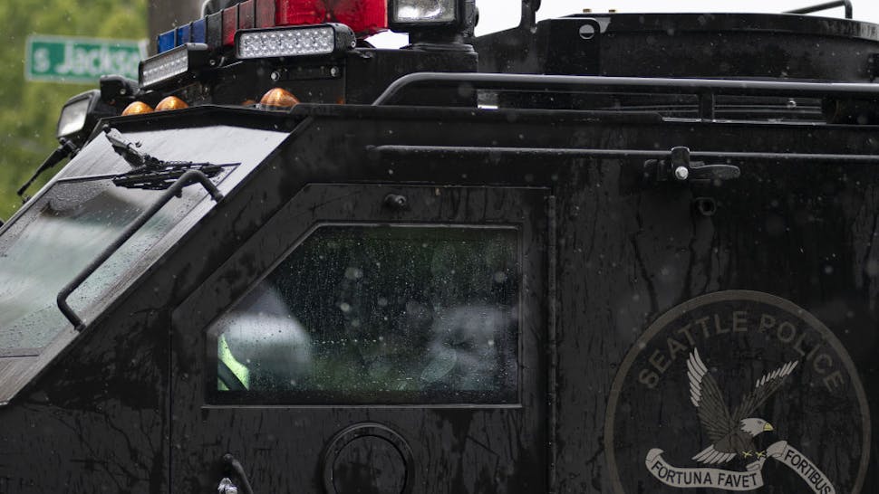 Capitol Hill Autonomous Zone protests in Seattle A Seattle Police Department SWAT vehicle drives to a protest in Seattle, Washington on June 12, 2020.