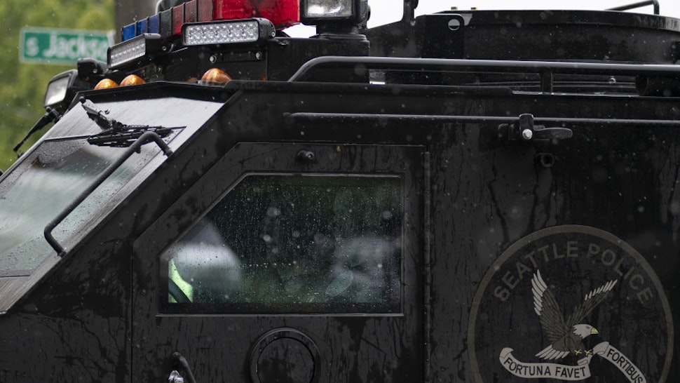 A Seattle Police Department SWAT vehicle drives to a protest in Seattle, Washington on June 12, 2020.