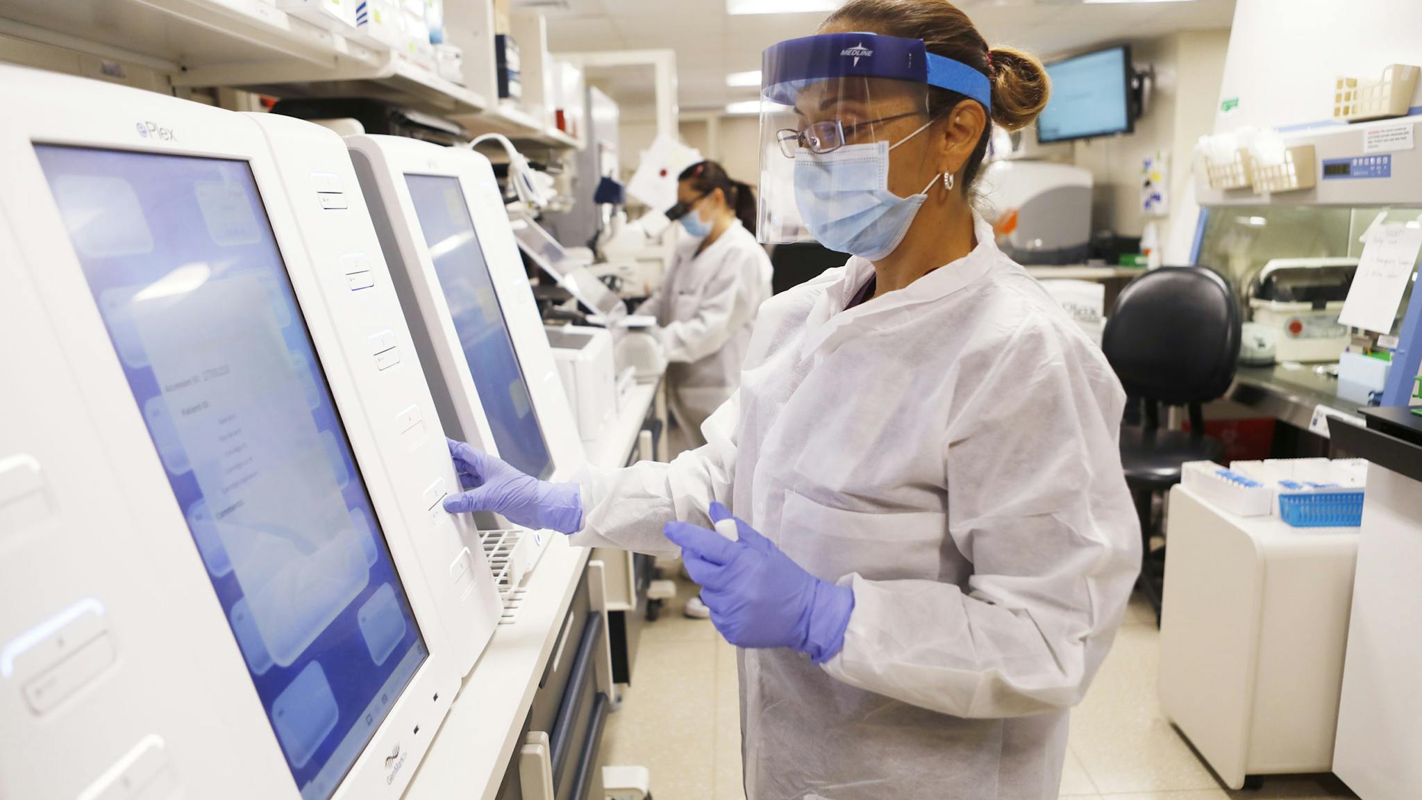 coronavirus TAMPA, FL - JUNE 25: Adriana Cardenas, a medical technologist processes test samples for the coronavirus at the AdventHealth Tampa labs on June 25, 2020 in Tampa, Florida. Florida is currently experiencing a surge in COVID-19 cases, as the state reached a new record for single-day infections on Wednesday with 5,511 new cases. (Photo by Octavio Jones/Getty Images)