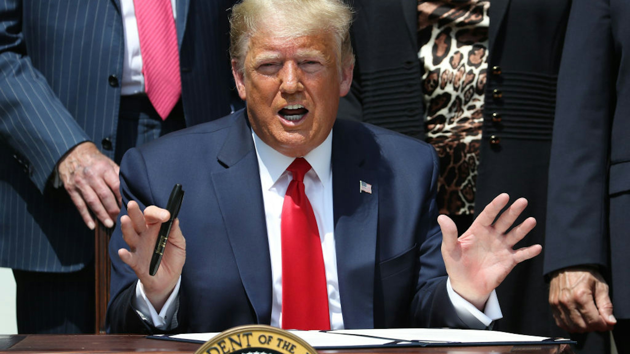 U.S. President Donald Trump speaks prepares to sign the Paycheck Protection Program Flexibility Act in the Rose Garden at the White House June 05, 2020 in Washington, DC.