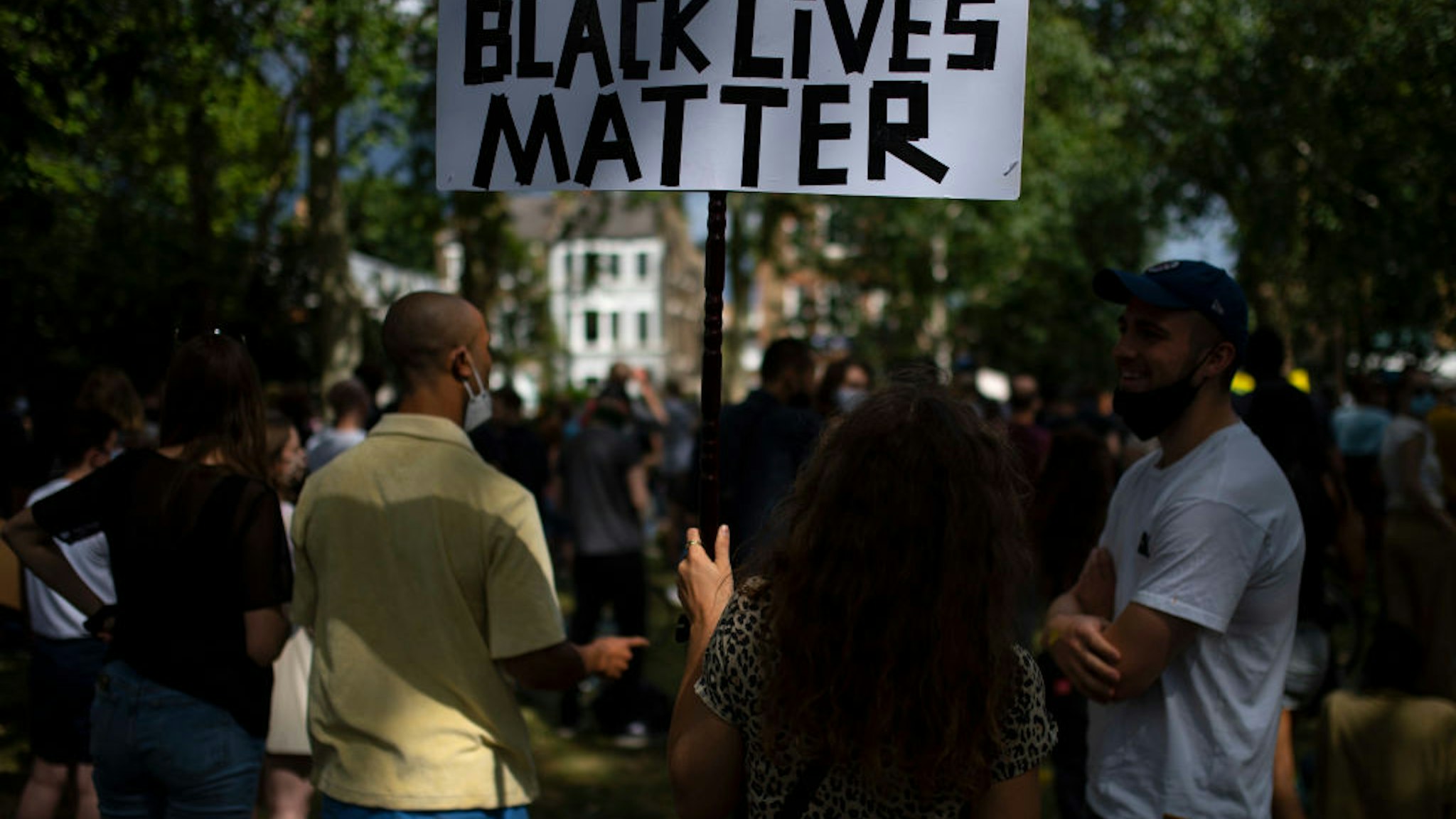 People protest during a Black Lives Matter rally in Newington Green on June 13, 2020 in London, England.
