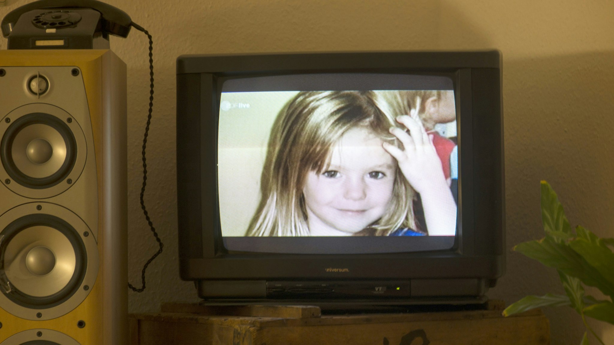 A photo of British girl Madeleine McCann aka Maddie is displayed on a TV screen at an appartmen in Berlin, on October 16, 2013 during the broadcast of German ZDF's "Aktenzeichen XY" programme. The German broadcaster received more than 500 phone calls and emails after airing the programme on the 2007 disappearance of British toddler Madeleine McCann in Portugal, the station said on October 16, 2013. The appeal, based on two years of work raking over the case by Scotland Yard's officers, was first broadcast in Great Britain on the BBC's "Crimewatch" programme. AFP PHOTO / JOHANNES EISELE (Photo credit should read JOHANNES EISELE/AFP via Getty Images)