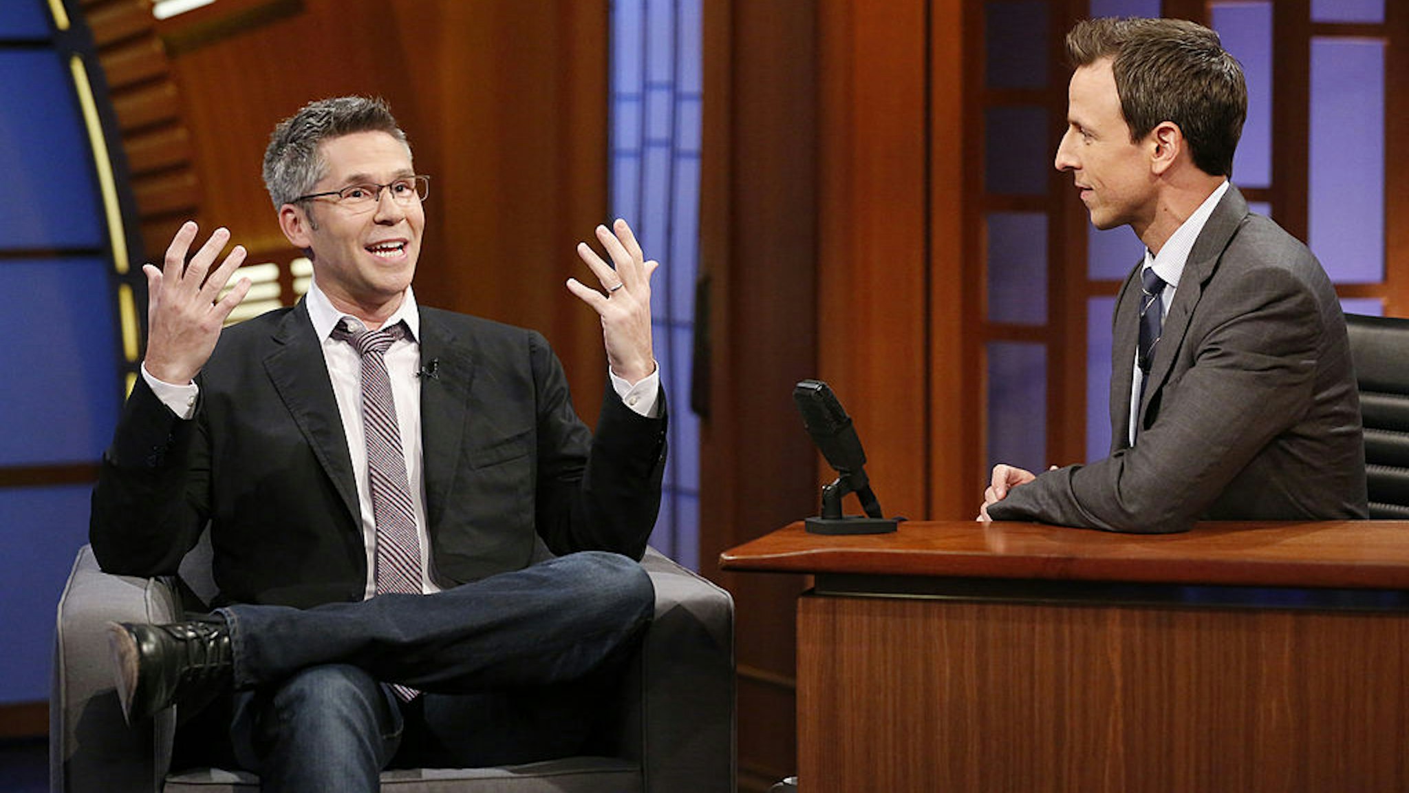 Comedian John Henson during an interview with host Seth Meyers on July 16, 2014