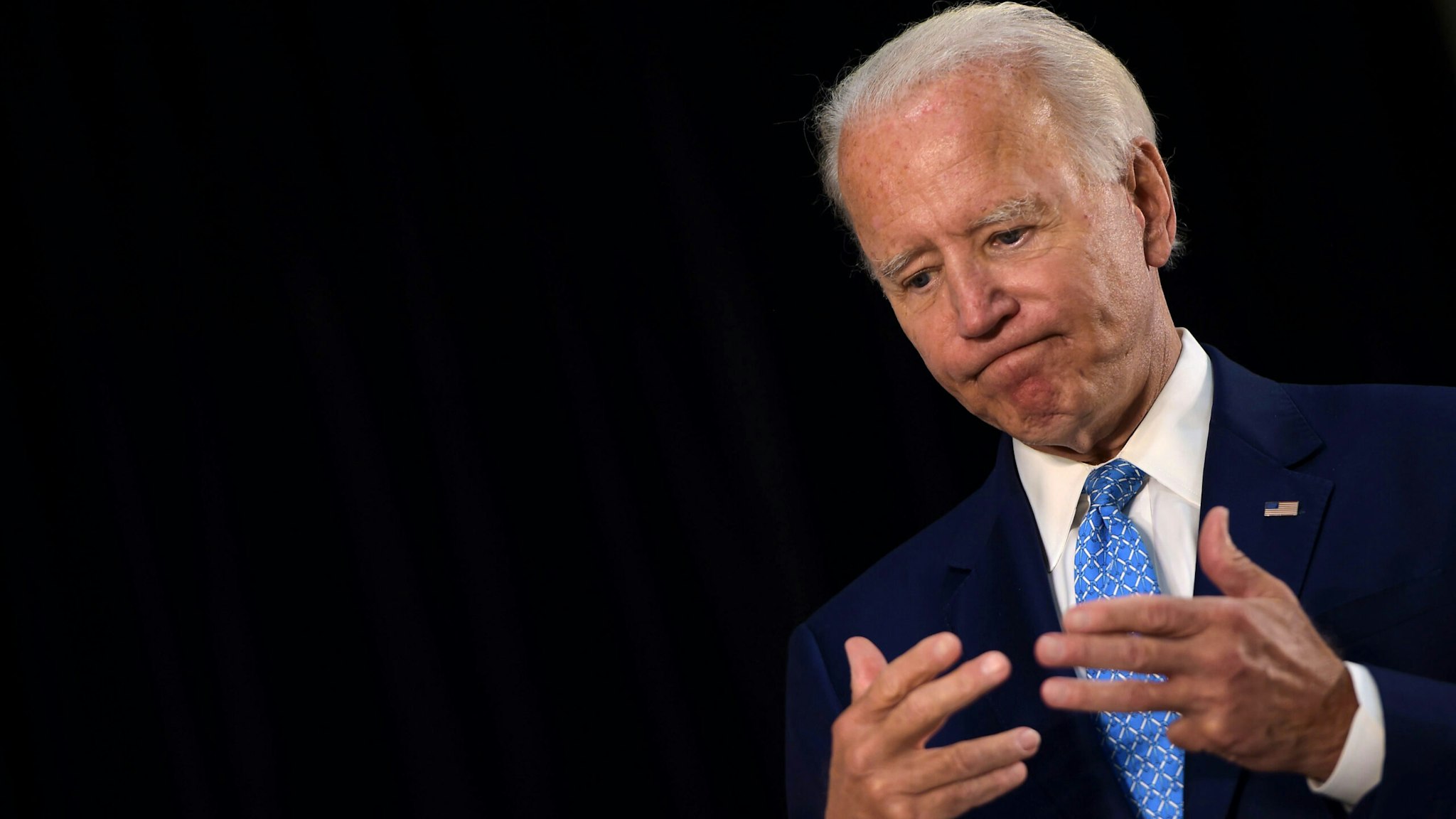 US Democratic presidential candidate Joe Biden answers questions after speaking about the coronavirus pandemic and the economy on June 30, 2020, in Wilmington, Delaware.