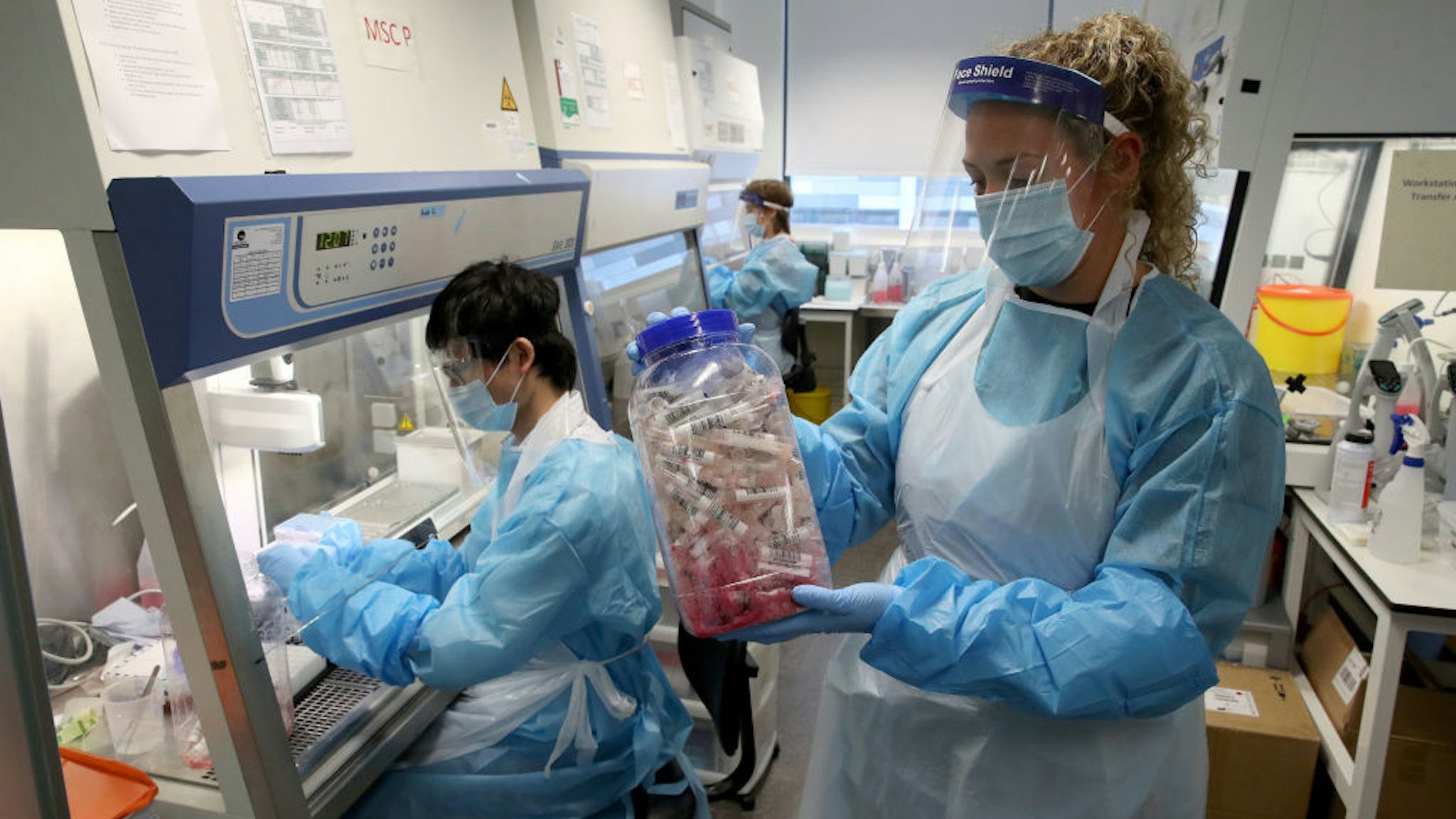 A Scientist holds samples ahead of them being discarded whilst working at the Lighthouse Laboratory at the Queen Elizabeth University Hospital in Glasgow which receives and analyses coronavirus swabs with suspected COVID-19 infections in the continuing fight against the coronavirus. Scotland continues in phase one of the Scottish Government's plan for gradually lifting lockdown. (Photo by Andrew Milligan/PA Images via Getty Images)