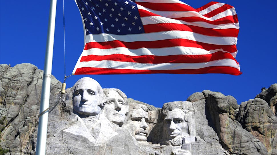 Old Glory and Mount Rushmore A very patriotic monument, Mount Rushmore is a giant granite cliff in South Dakota with the heads of four US presidents - Washington, Lincoln, Jefferson and Roosevelt (Teddy) - carved into it.It's big. Very big.