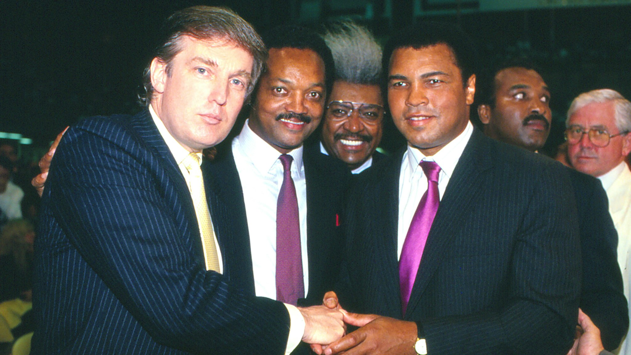 ATLANTIC CITY, NJ - JUNE 27: Businessman Donald Trump, Jessie Jackson, Don King and Muhammad Ali ringside at Tyson vs Holmes Convention Hall in Atlantic City, New Jersey June 27 1988.