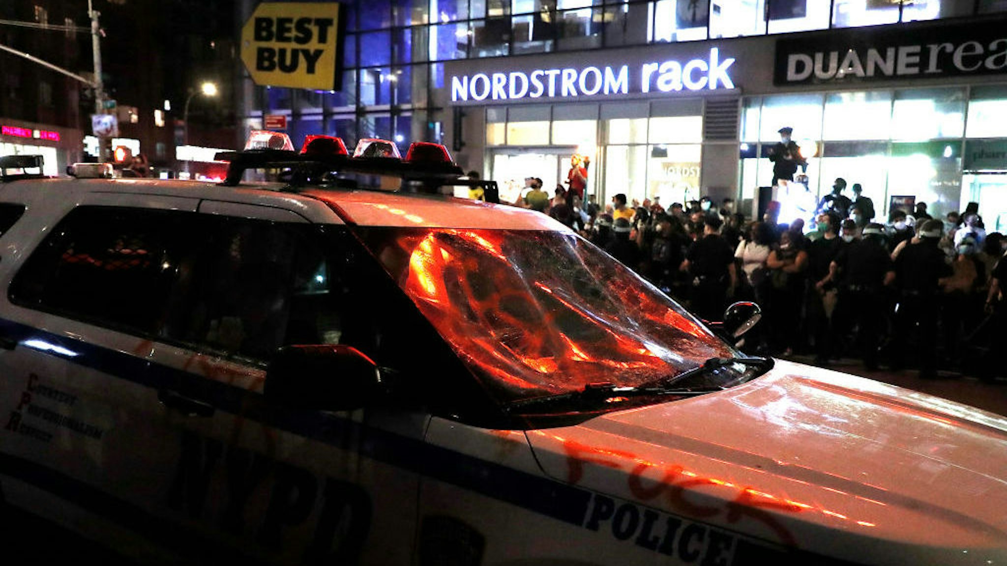 A police car with smashed wind shield is seen in UnionSquare during a demonstration in response to the death of a Minneapolis man George Floyd on May 29, 2020 in New York City. The video that captured the death of George Floyd implicated the arresting officers sparking days of riots in Minneapolis Minnesota. Governor Tim Waltzs attempt to quell the violence and looting by calling in the National Guard, failed to enforce the curfew. (Photo by John Lamparski/NurPhoto via Getty Images)
