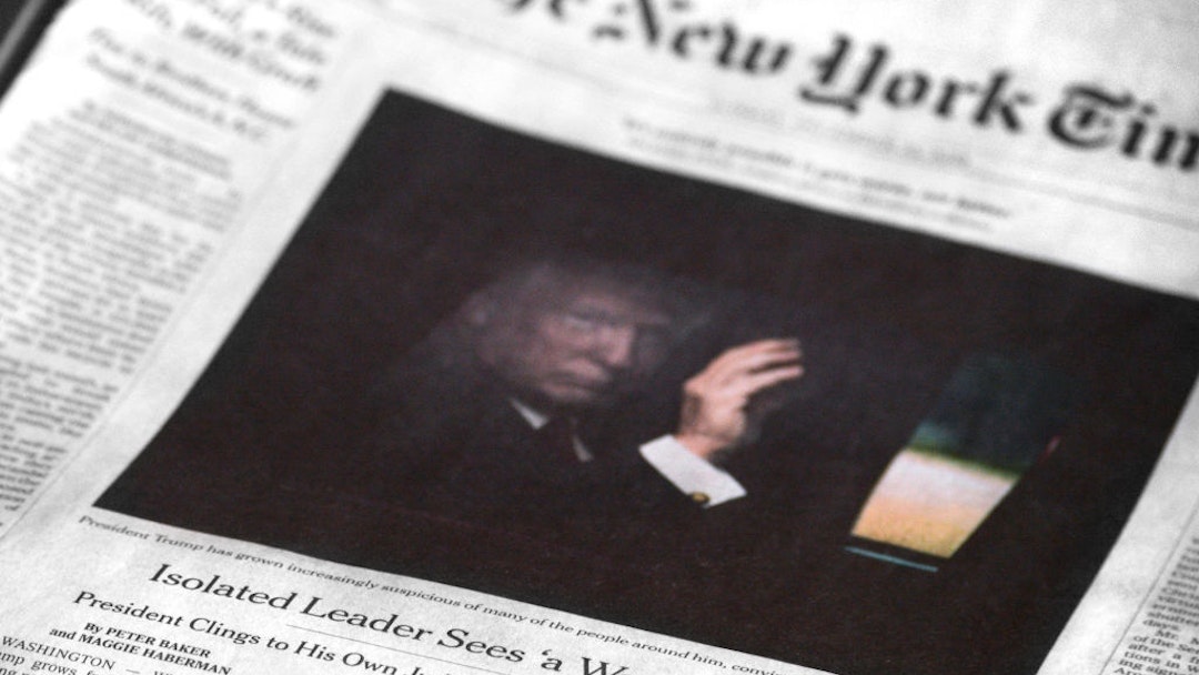A copy of the December 23, 2018 edition of The New York Times features a front-page article by Peter Baker and Maggie Haberman referring to U.S. President Donald Trump as an isolated leader who sees 'a war every day.' (Photo by Robert Alexander/Getty Images)