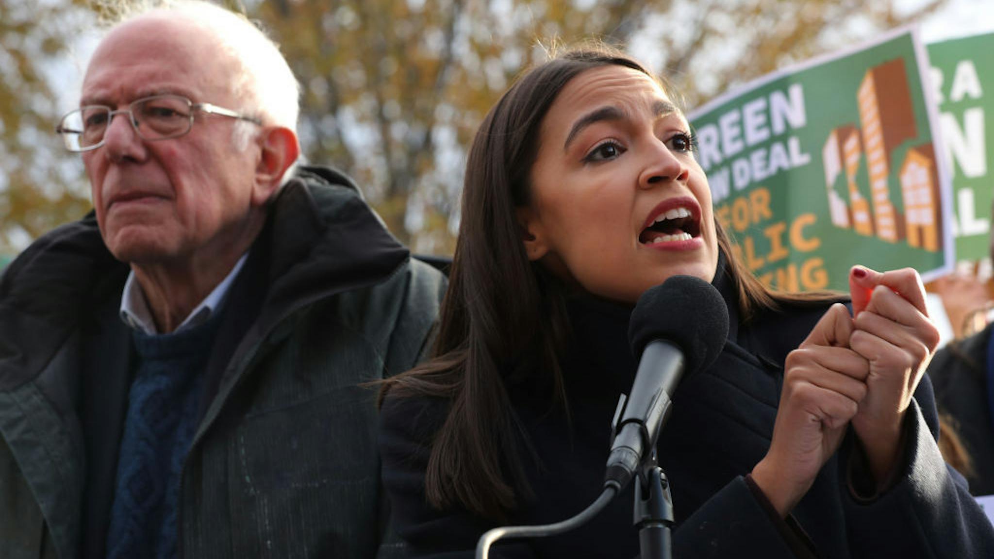 Sen. Bernie Sanders And Rep. Alexandria Ocasio-Cortez Introduce Housing Green New Deal Democratic presidential candidate Sen. Bernie Sanders (I-VT) (L) and Rep. Alexandria Ocasio-Cortez (D-NY) hold a news conference to introduce legislation to transform public housing as part of their Green New Deal proposal outside the U.S. Capitol November 14, 2019 in Washington, DC. The liberal legislators invited affordable housing advocates and climate change activists to join them for the announcement. (Photo by Chip Somodevilla/Getty Images)