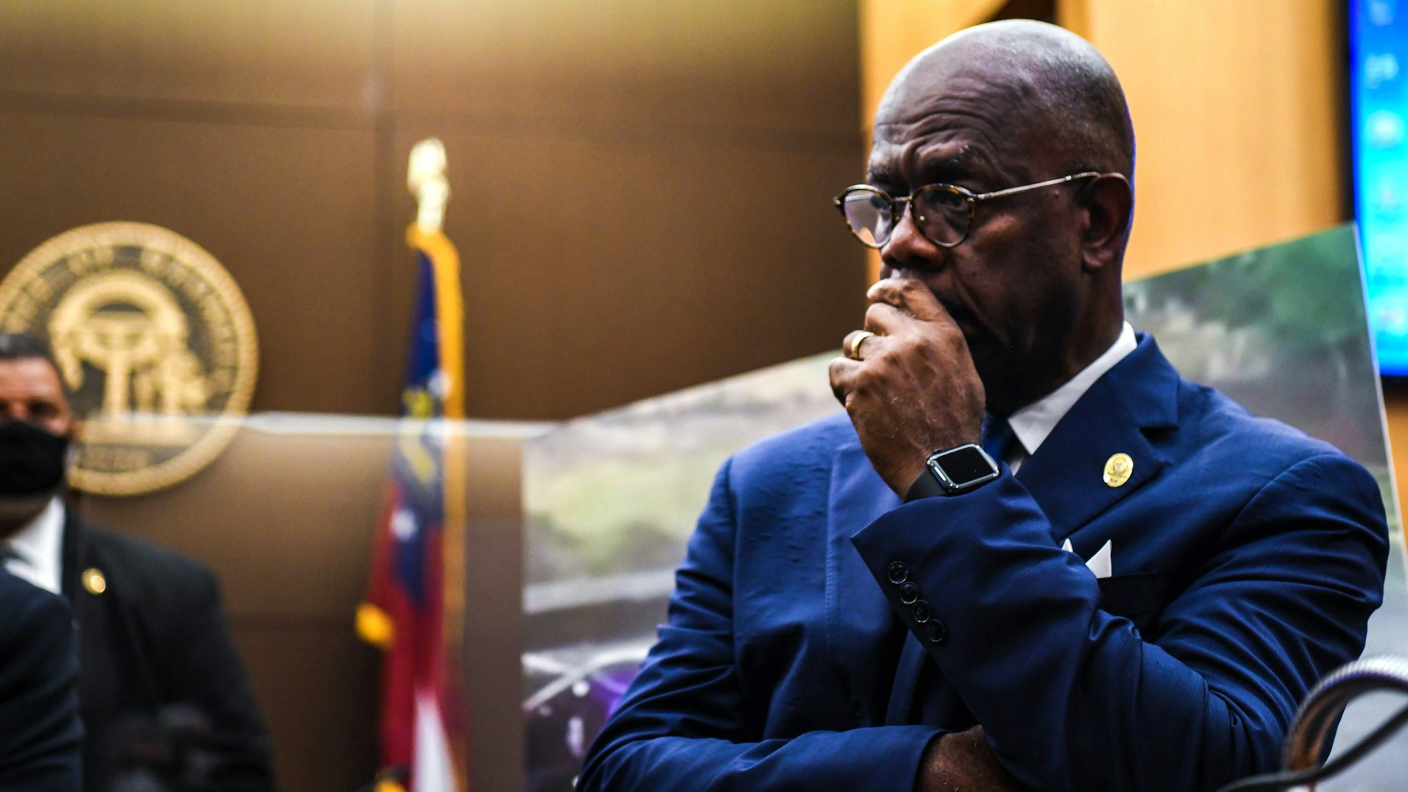Fulton County District Attorney Paul Howard listens during a pres conference where he announced 11 charges against former Atlanta Police Officer Garrett Rolfe, on June 17, 2020, in Atlanta, Georgia. - Rolfe will be charged with murder for shooting Rayshard Brook, 27, in the back, Howard, announced, in the latest case to spark anger over police killings of African Americans.
