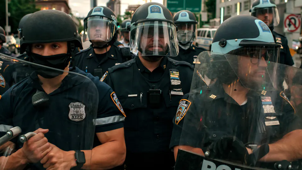 Protests Against Police Brutality Over Death Of George Floyd Continue In NYC NEW YORK, NY - JUNE 02: NYPD officers block the entrance of the Manhattan Bridge as hundreds protesting police brutality and systemic racism attempt to cross into the borough of Manhattan from Brooklyn after a citywide curfew went into effect in New York City. Days of protest, sometimes violent, have followed in many cities across the country in response to the death of George Floyd while in police custody in Minneapolis, Minnesota on May 25th.