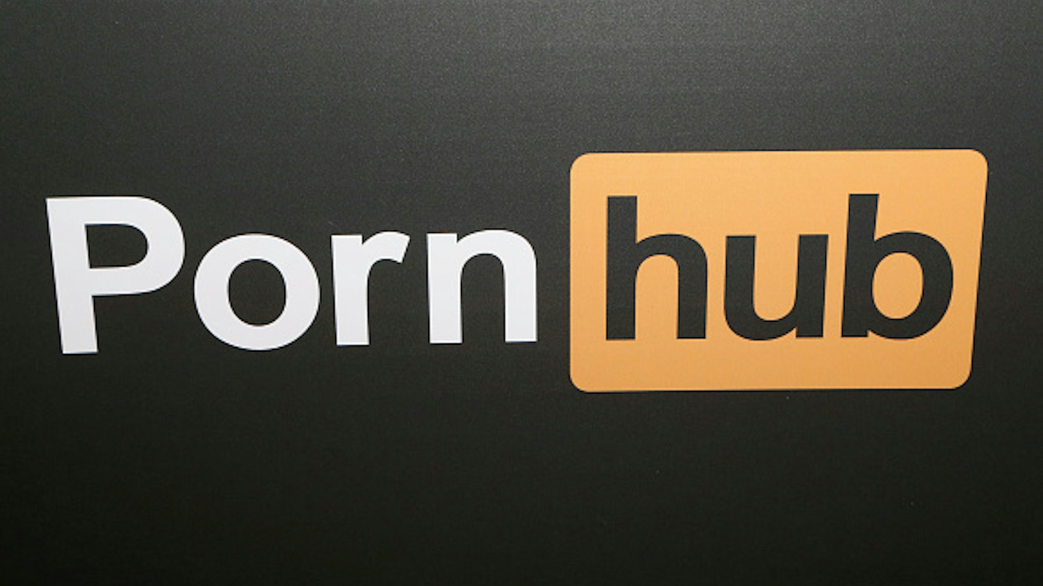 LAS VEGAS, NV - JANUARY 25: A Pornhub logo is displayed at the company's booth during the 2018 AVN Adult Expo at the Hard Rock Hotel &amp; Casino on January 25, 2018 in Las Vegas, Nevada.