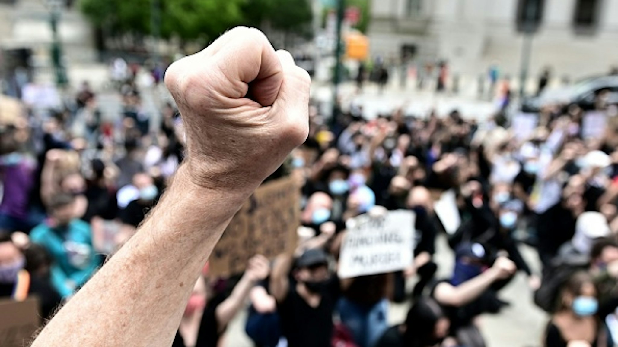 Protesters demonstrate on June 2, 2020, during a "Black Lives Matter" protest in New York City. - Anti-racism protests have put several US cities under curfew to suppress rioting, following the death of George Floyd while in police custody.