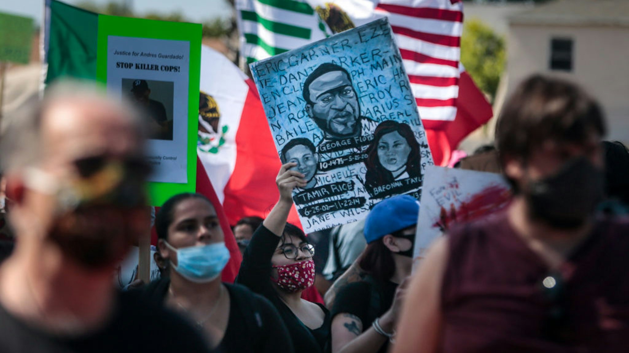 Hundreds of people rallied and marched to the Compton Sheriffs' Office in protest for the shooting of Andres Guardado, security guard who was fatally shot by a Los Angeles County sheriff's deputy on Sunday, June 21, 2020 in Gardena, California. (Jason Armond / Los Angeles Times via Getty Images)