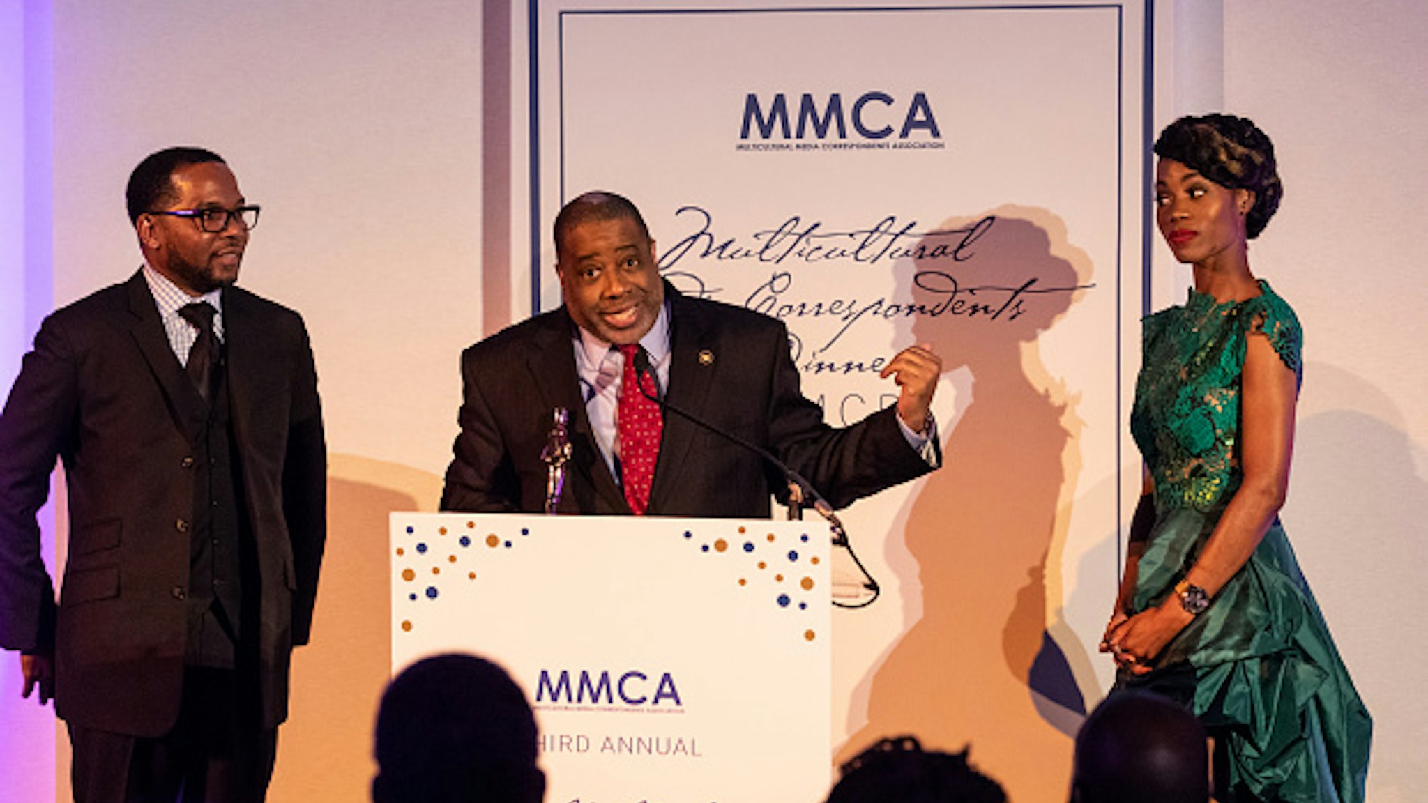 Fifth Estate, New Media Journalist of the Year honoree: Raynard Jackson (center), Syndicated Columnist for NNPA, accepts his award, recognizing his friends (L-R): Carvin Haggins, Grammy award winning songwriter/producer, and singer Algebra Blessett, at the Third Annual Multicultural Media Correspondents Dinner at the National Press Club in Washington, D.C. on Thursday, May 24, 2018.