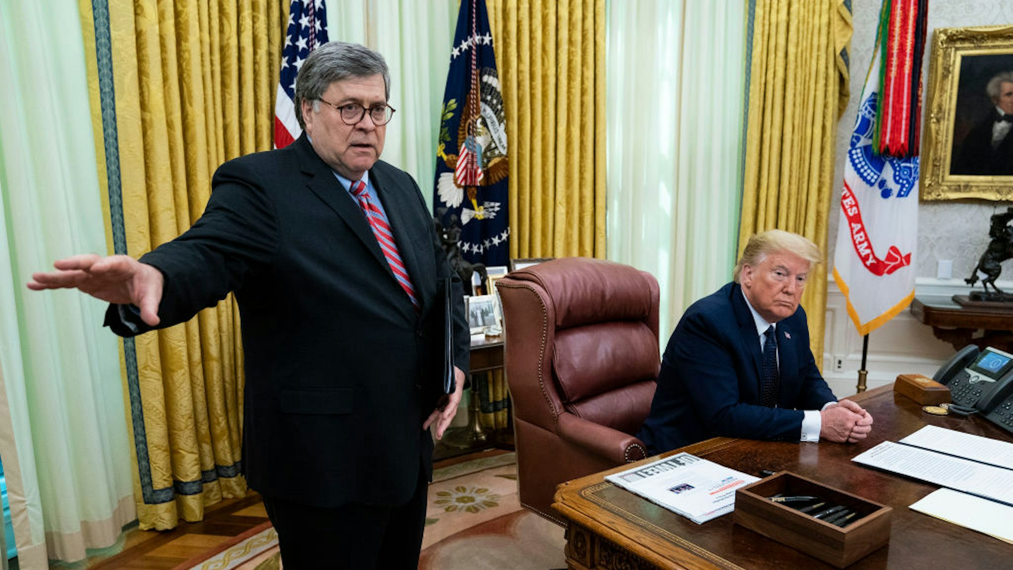 President Donald Trump with Attorney General William Barr, make remarks before signsing an executive order in the Oval Office that will punish Facebook, Google and Twitter for the way they police content online, Thursday, May 28, 2020. ( Photo by Doug Mills/The New York Times)