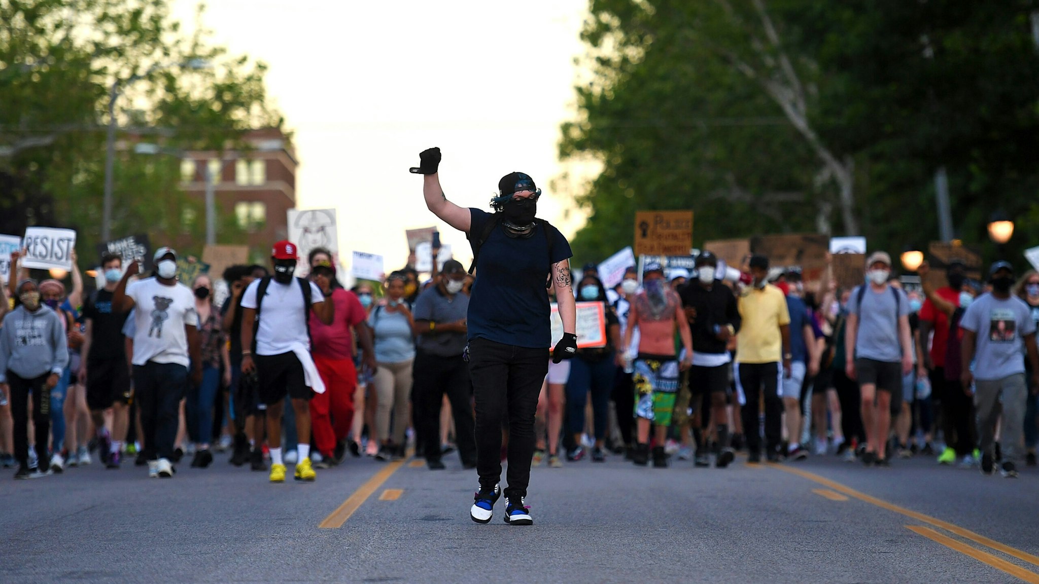 UNIVERSITY CITY, MO - JUNE 12: Protesters take to the street to protest against police brutality on June 12, 2020 in University City, Missouri. Protest continue across the world since George Floyd died in Minneapolis police custody on May 25.