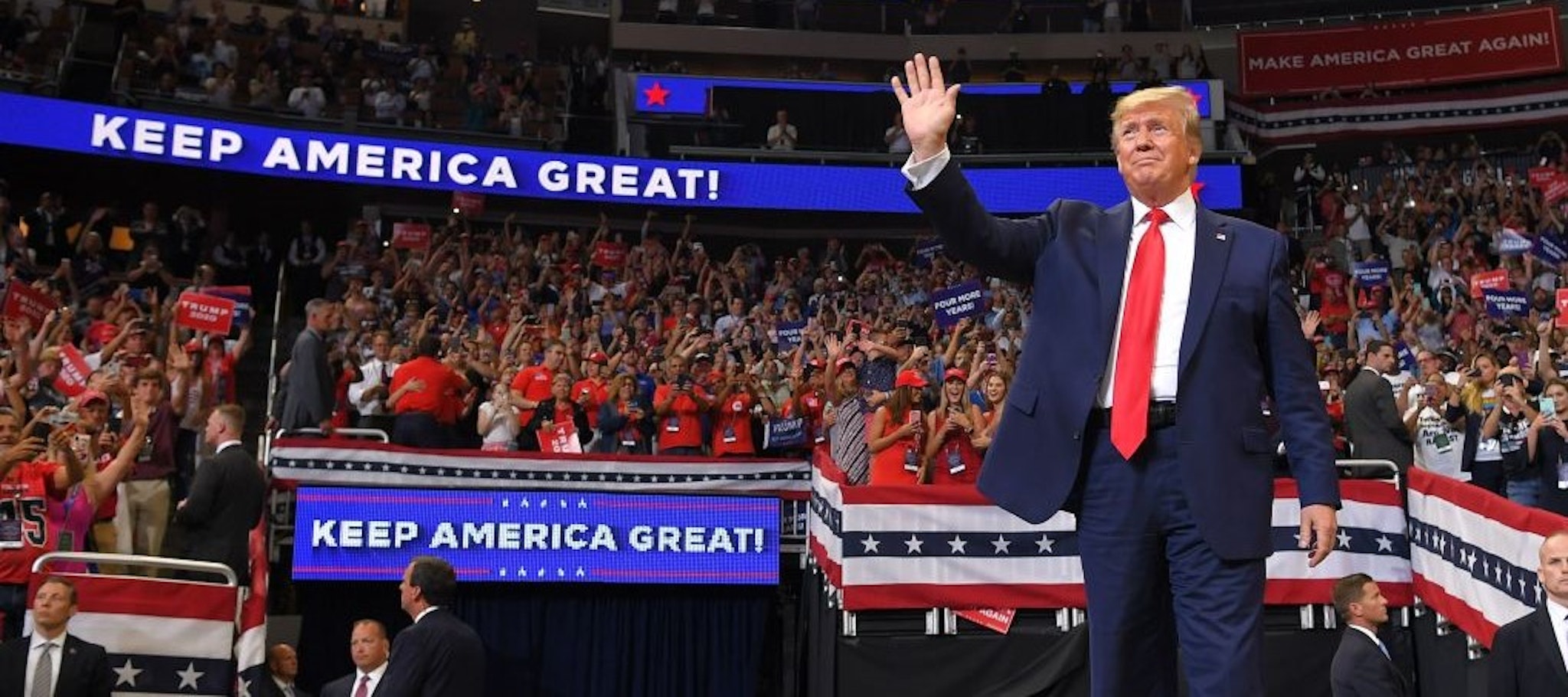 TOPSHOT - US President Donald Trump arrives to speak during a rally at the Amway Center in Orlando, Florida to officially launch his 2020 campaign on June 18, 2019. - Trump kicks off his reelection campaign at what promised to be a rollicking evening rally in Orlando. (Photo by MANDEL NGAN / AFP) (Photo by