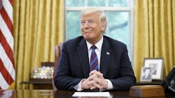 US-MEXICO-CANADA-NAFTA-TRADE-TRUMP US President Donald Trump smiles during a phone conversation with Mexico's President Enrique Pena Nieto on trade in the Oval Office of the White House in Washington, DC on August 27, 2018. - President Donald Trump said Monday the US had reached a "really good deal" with Mexico and talks with Canada would begin shortly on a new regional free trade pact."It's a big day for trade. It's a really good deal for both countries," Trump said."Canada, we will start negotiations shortly. I'll be calling their prime minister very soon," Trump said.US and Mexican negotiators have been working for weeks to iron out differences in order to revise the nearly 25-year old North American Free Trade Agreement, while Canada was waiting to rejoin the negotiations. (Photo by MANDEL NGAN / AFP) (Photo by