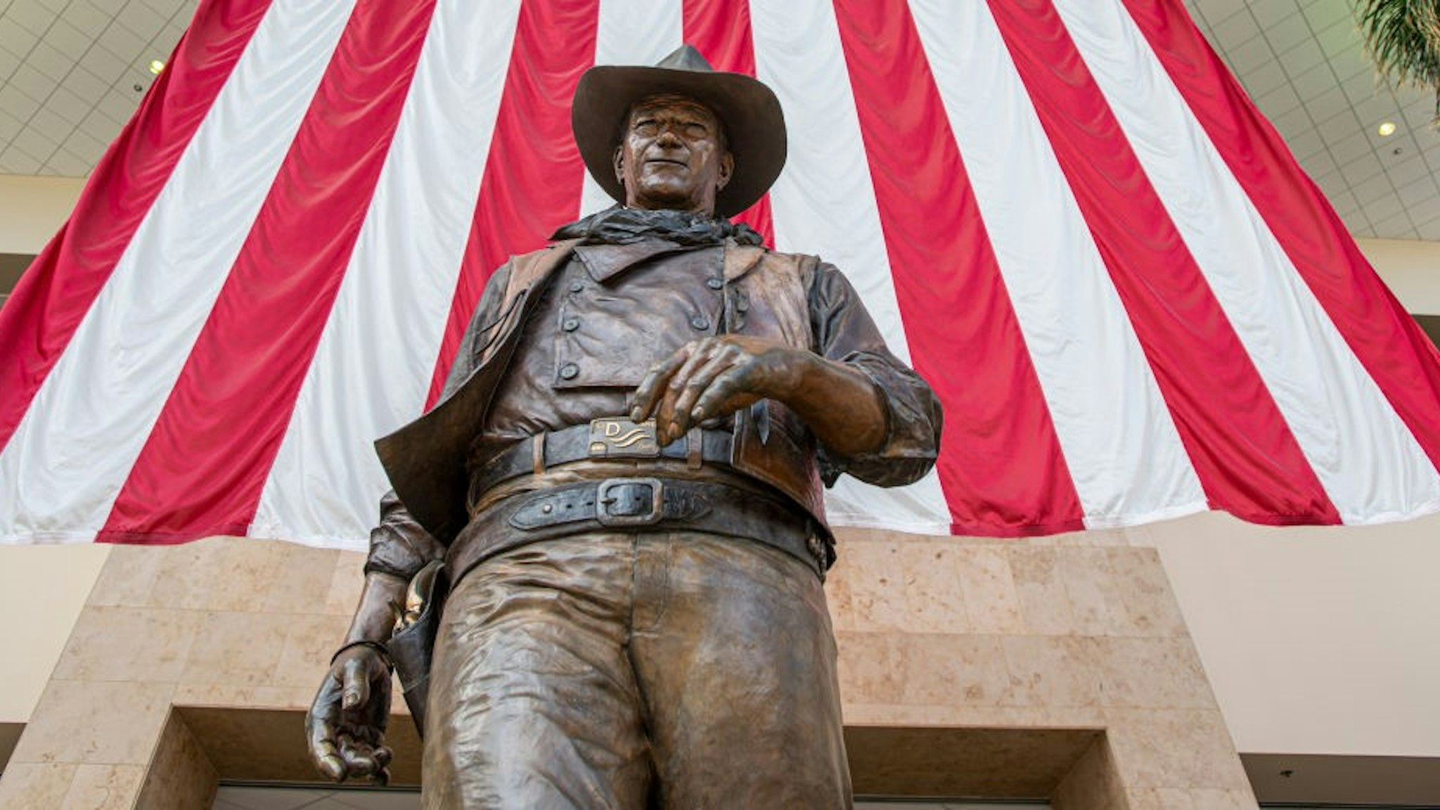 SANTA ANA, CA - SEPTEMBER 25: The statue of John Wayne at John Wayne Airport in Santa Ana on Wednesday, September 25, 2019. (Photo by