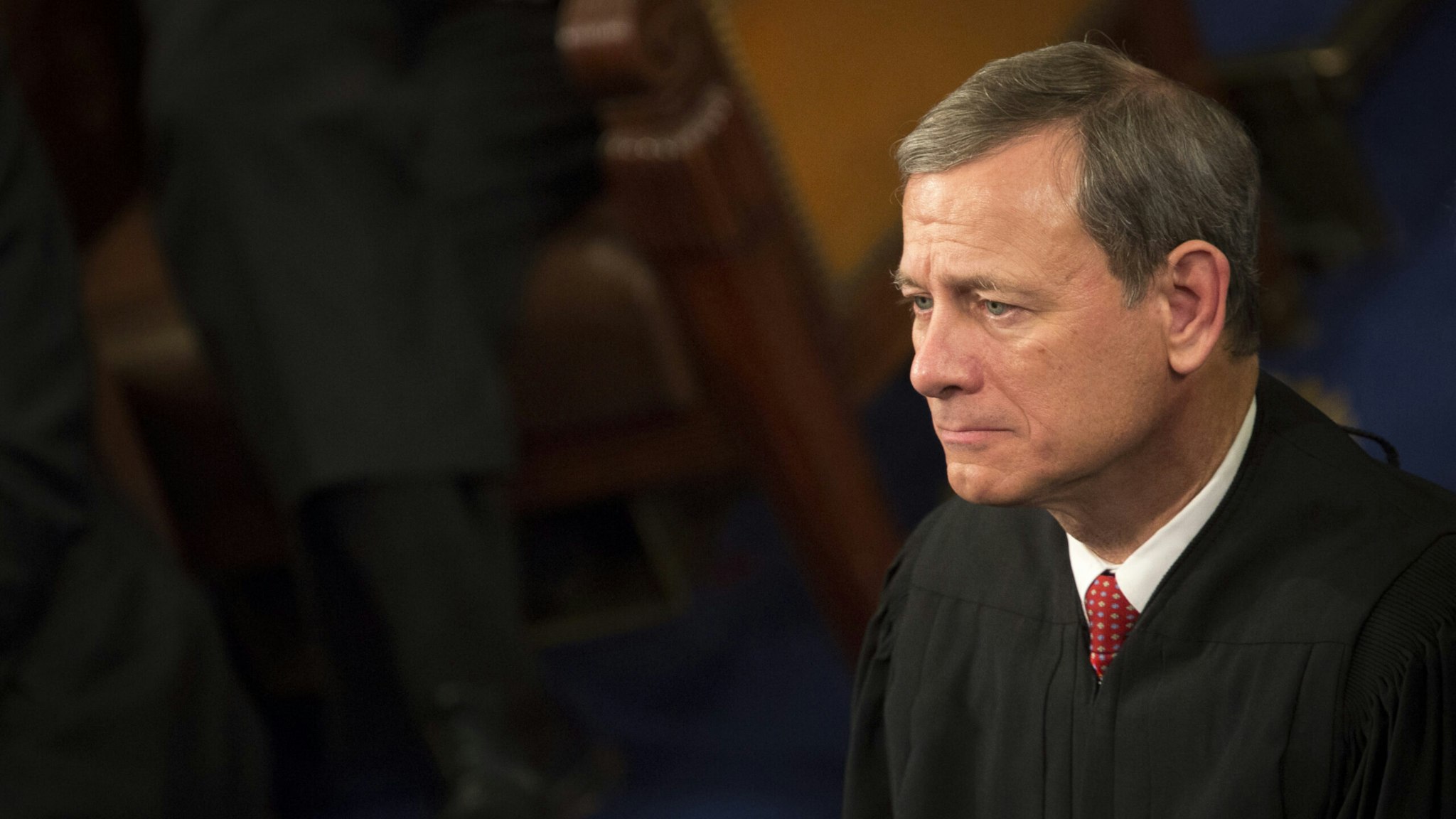 Chief Supreme Court Justice John Roberts listens as U.S. President Barack Obama delivers the State of the Union address to a joint session of Congress at the Capitol in Washington, D.C., U.S., on Tuesday, Jan. 12, 2016.