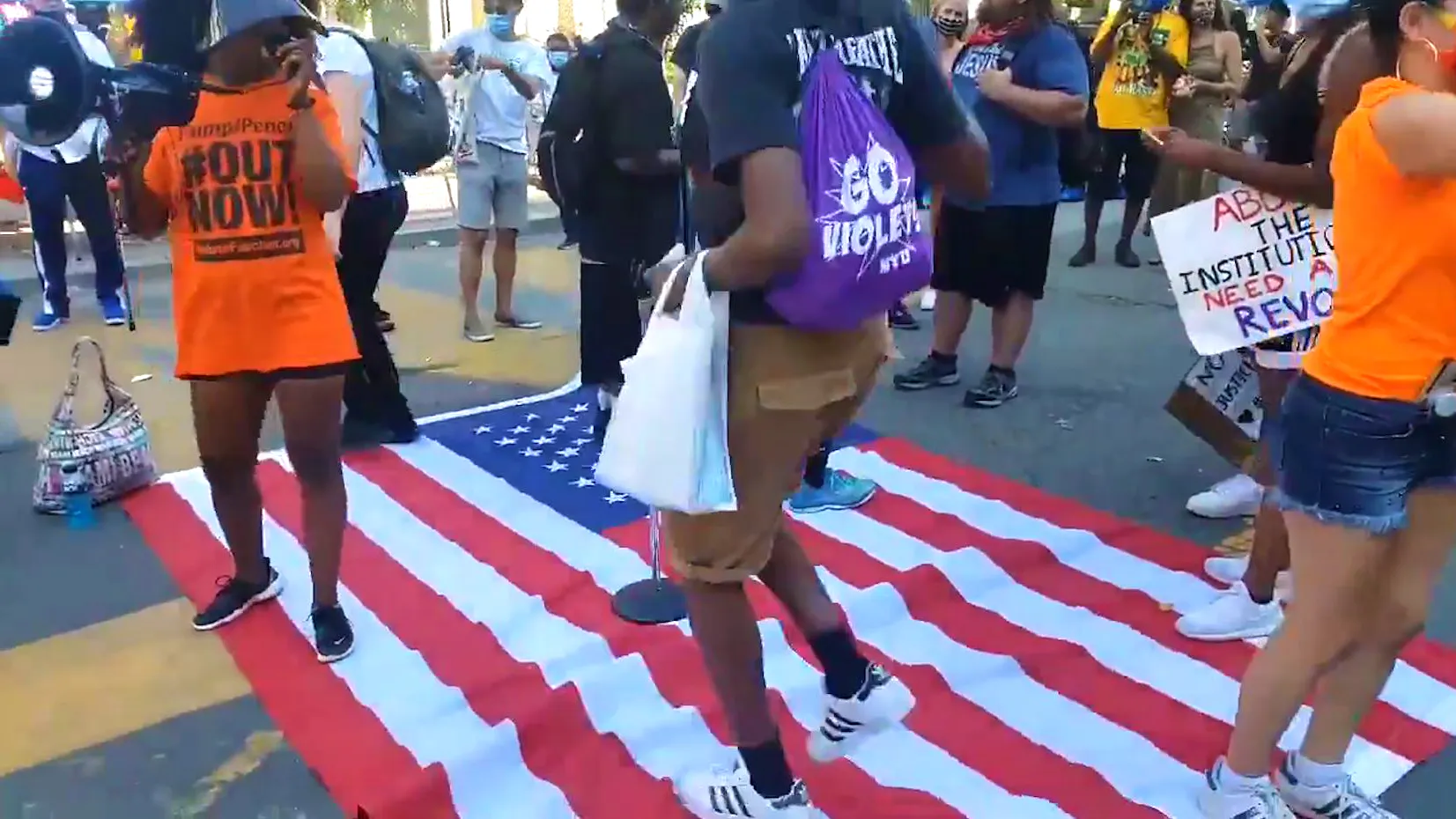 Far-Left Activists Dance On American Flag: ‘F*** The 4th Of July, F*** The American Flag’