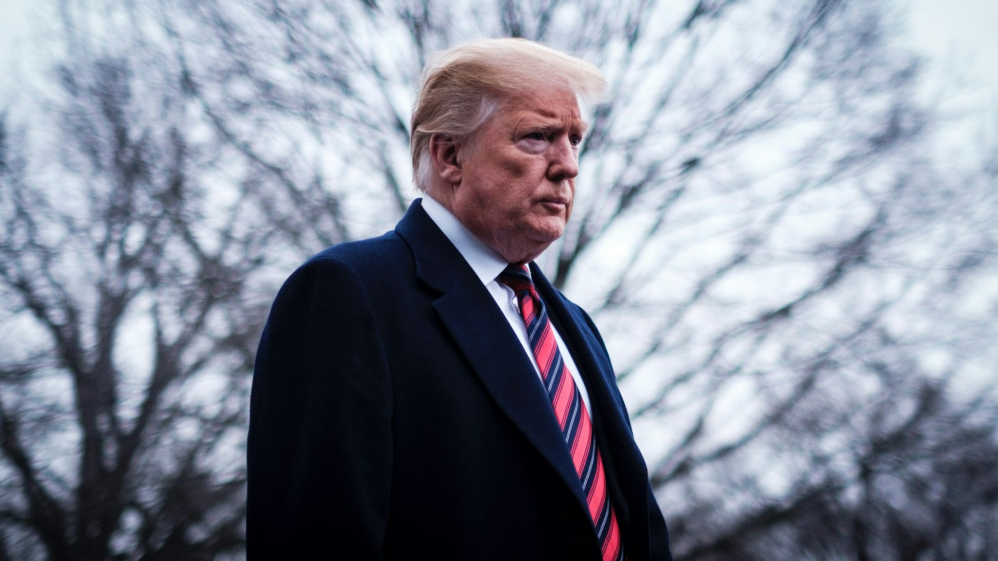U.S. President Donald Trump stops to speak to reporters as he prepared to board Marine One on the South Lawn of the White House on January 19, 2019 in Washington, DC.