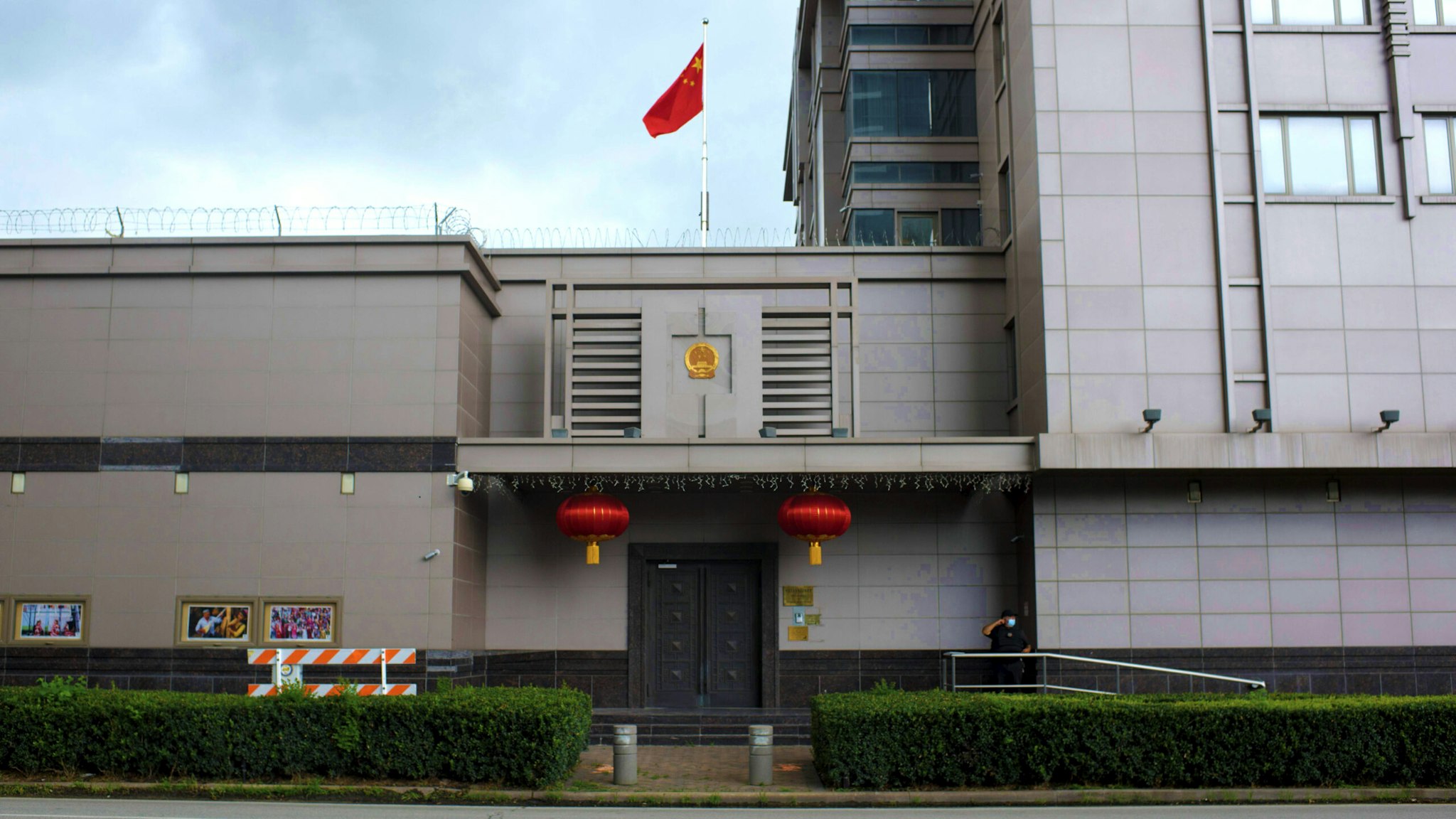 The Chinese flag flies outside of the Chinese consulate in Houston after the US State Department ordered China to close the consulate in Houston, Texas, July 22, 2020. - US-Chinese tensions, already rising because of the coronavirus pandemic and crackdown in Hong Kong, ratcheted up another notch on Wednesday as the US ordered the closure of the Chinese consulate in Houston within 72 hours. China reacted angrily to the US move, which came a day after the unveiling of a US indictment of two Chinese nationals for allegedly hacking hundreds of companies worldwide.