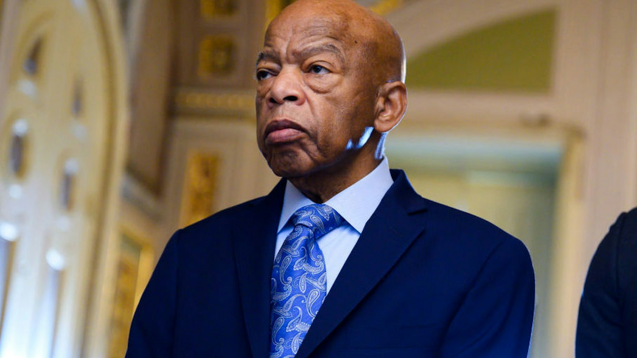 UNITED STATES - DECEMBER 3: Rep. John Lewis, D-Ga., waits to enter the Senate chamber to listen to the farewell address of the Sen. Johnny Isakson, R-Ga., in the Capitol on Tuesday, December 3, 2019.