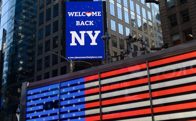 A 'Welcome back NY' billboard is seen in Times Square as the city moves into Phase 2 of re-opening following restrictions imposed to curb the coronavirus pandemic on June 23, 2020 in New York City. Phase 2 permits the reopening of offices, in-store retail, outdoor dining, barbers and beauty parlors and numerous other businesses. Phase 2 is the second of four-phased stages designated by the state. (Photo by Noam Galai/Getty Images)