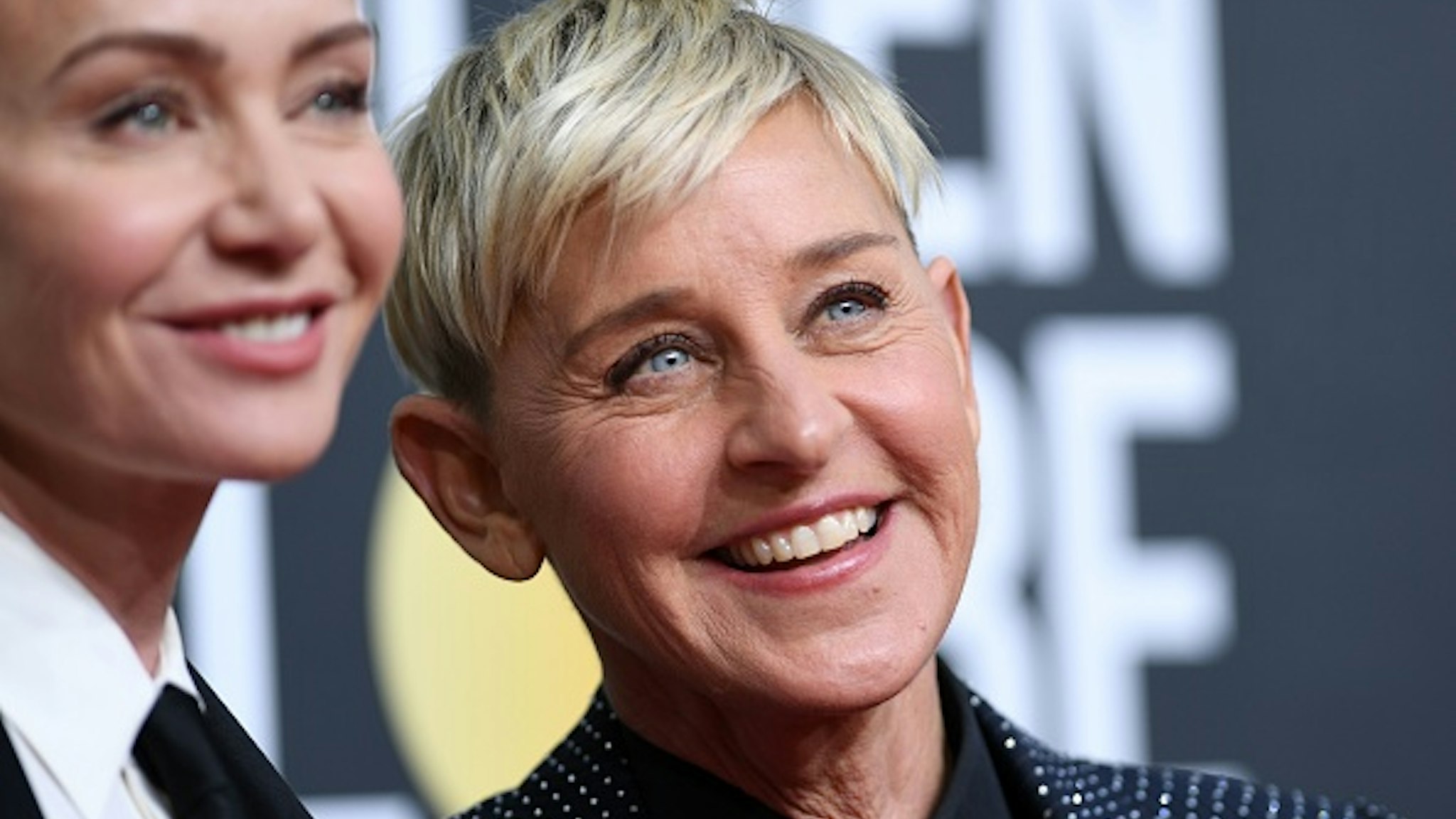 US actress Portia de Rossi (L) and US comedian Ellen DeGeneres arrives for the 77th annual Golden Globe Awards on January 5, 2020, at The Beverly Hilton hotel in Beverly Hills, California.