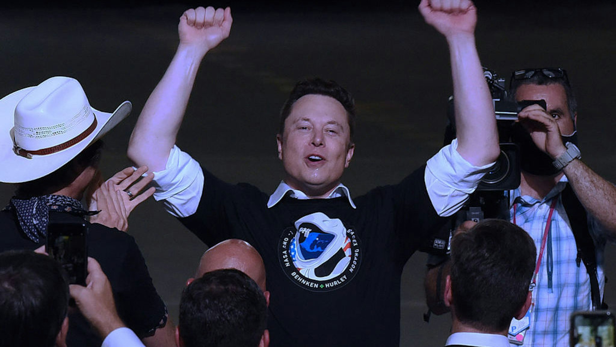 CAPE CANAVERAL, UNITED STATES - 2020/05/30: SpaceX founder Elon Musk celebrates after being recognized by U.S. Vice President Mike Pence at NASA's Vehicle Assembly Building following the successful launch of a Falcon 9 rocket with the Crew Dragon spacecraft from pad 39A at the Kennedy Space Center.